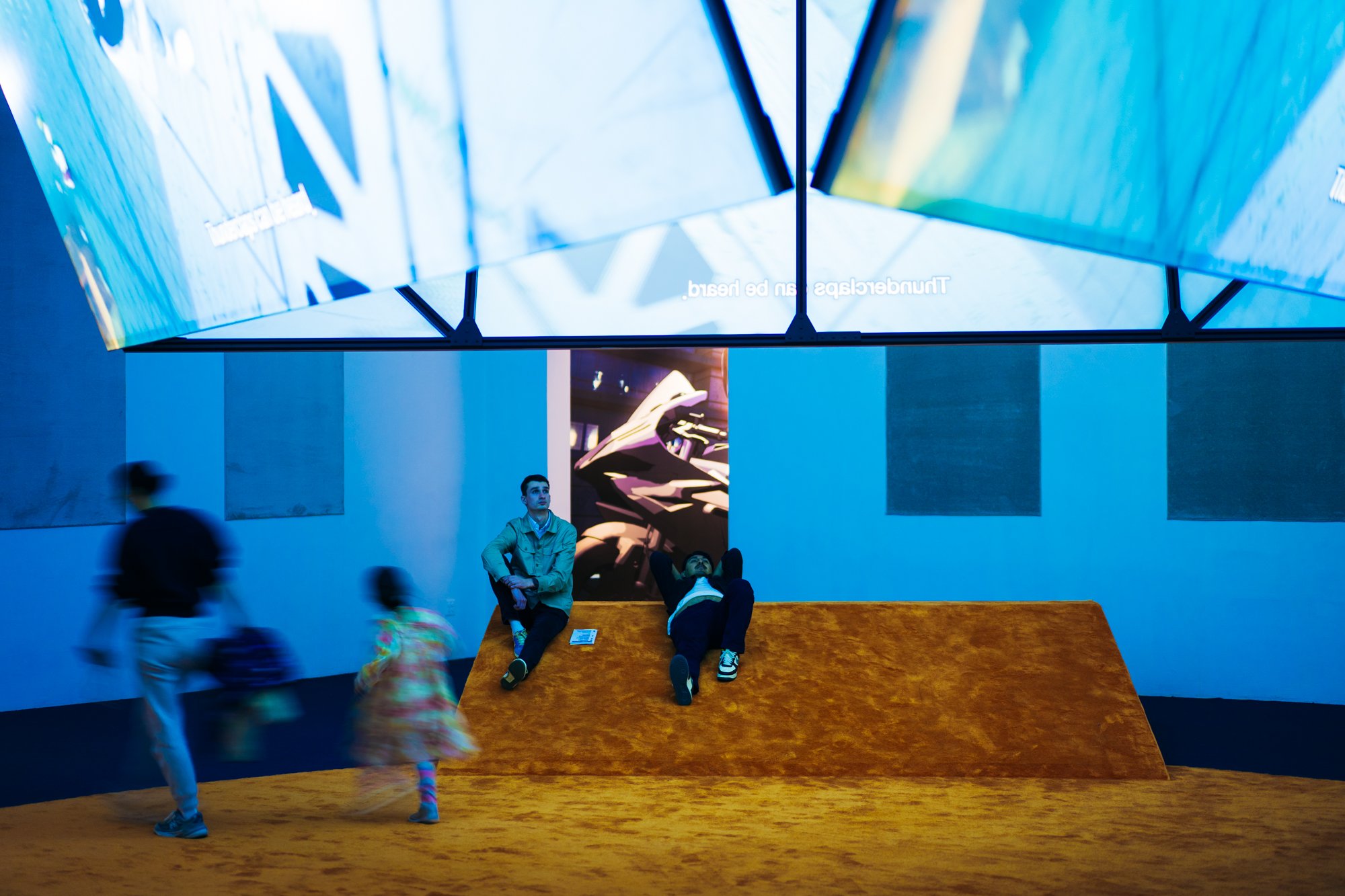 People engaging with installation