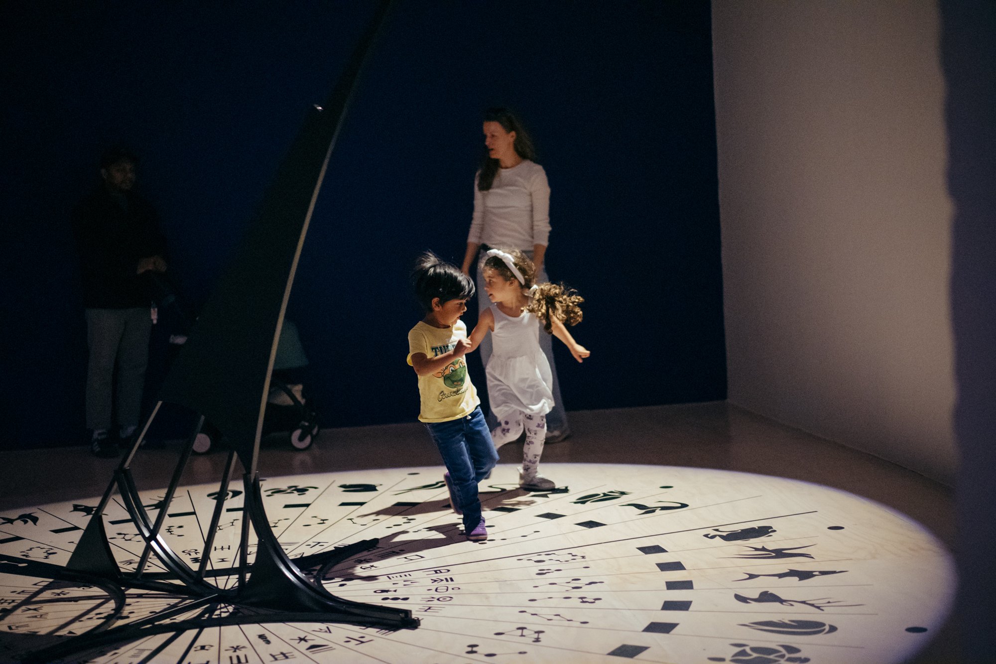 Children engaging with artwork