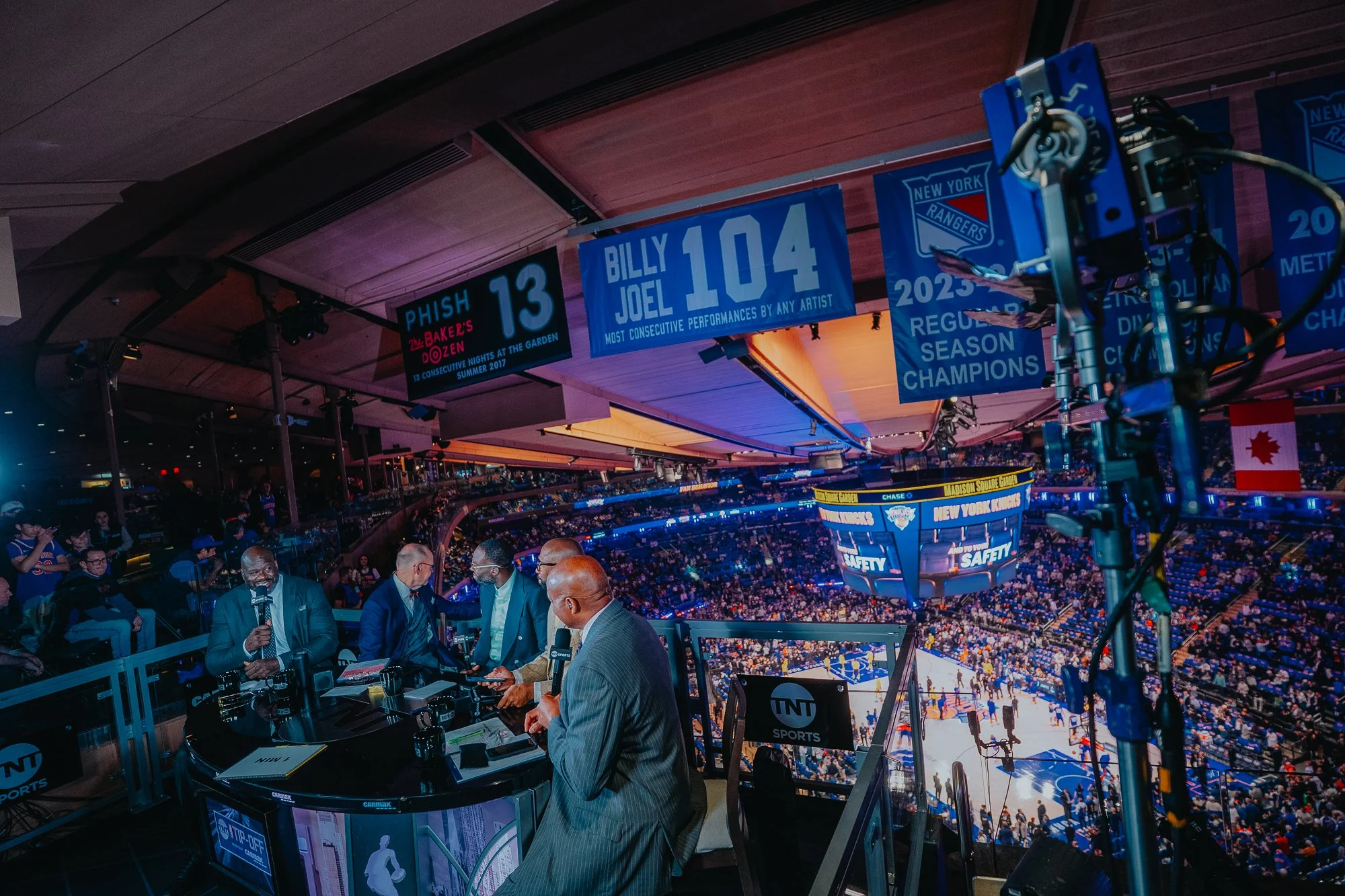 Commentators sitting at table