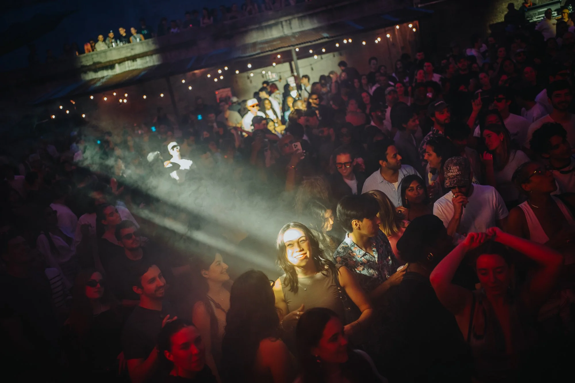 Fan smiling in the crowd