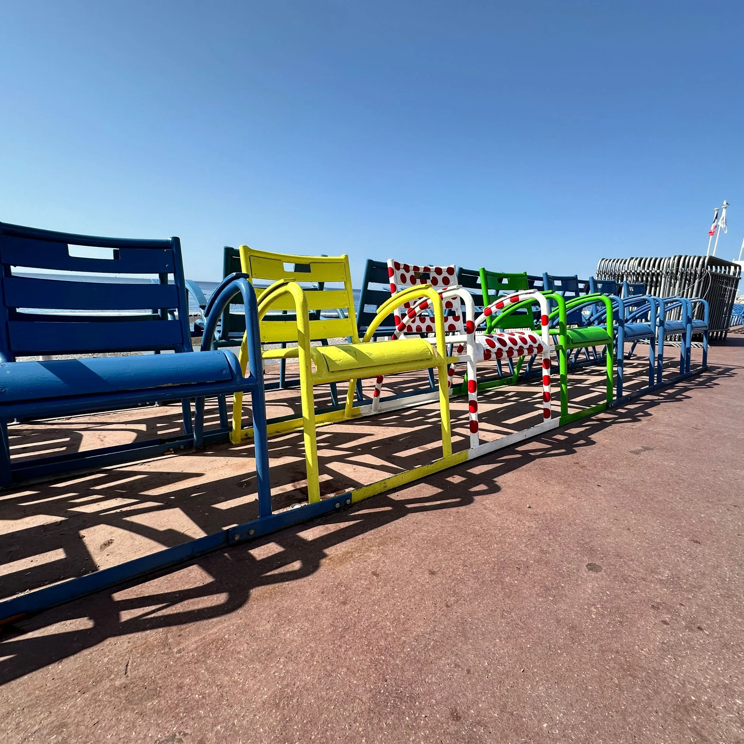 Blue  Yellow Green and Red Chairs on Promenade des Anglais.jpg