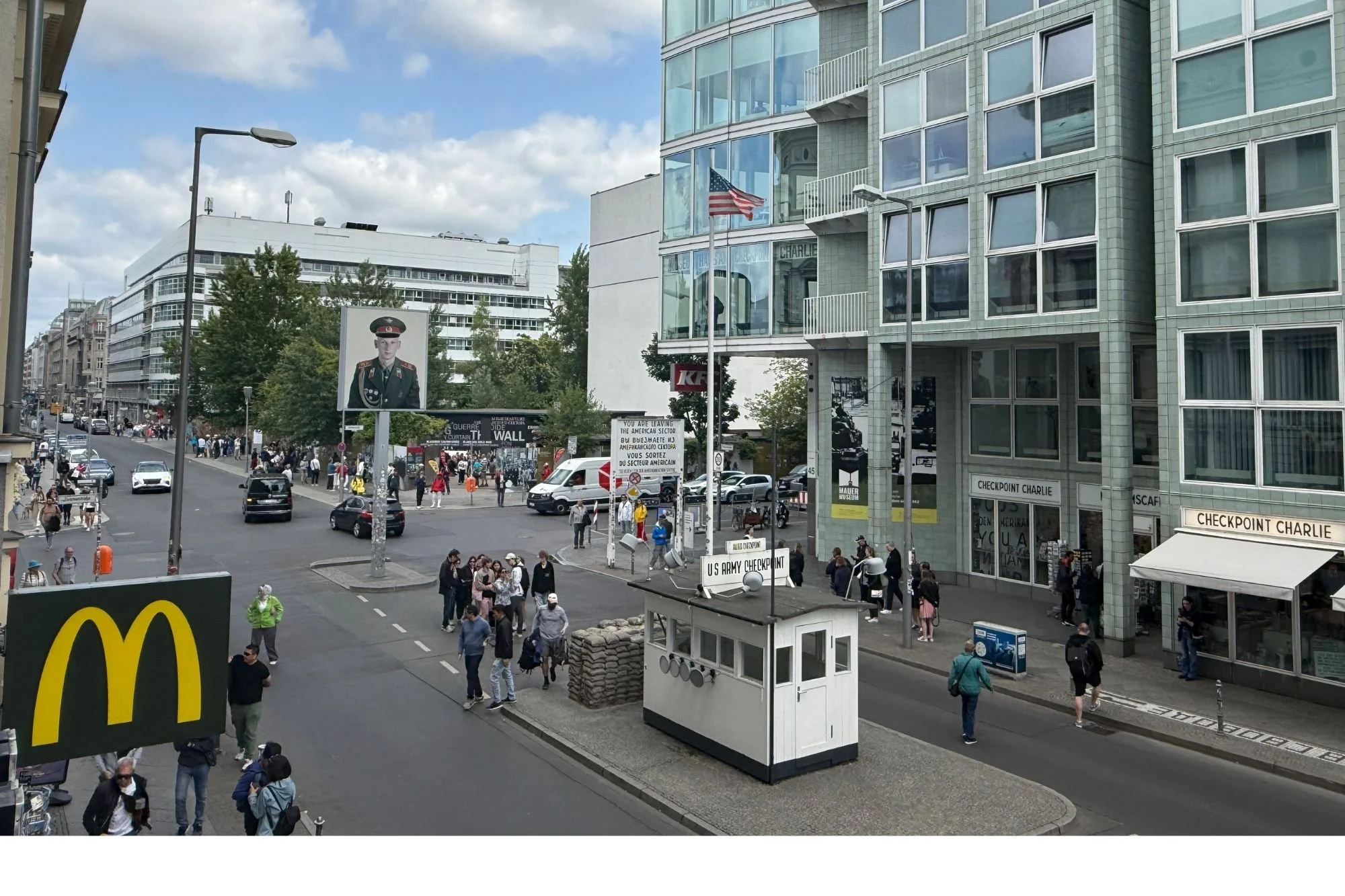 A picture of Checkpoint Charlie taken with the McDonalds sign in the foreground