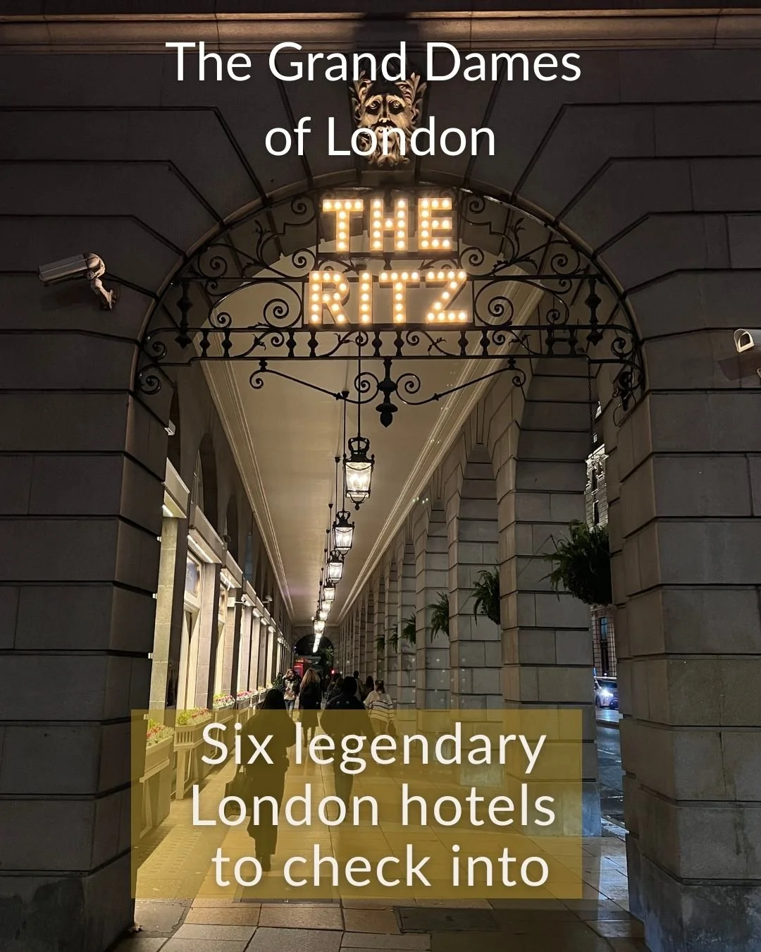 A stone archway is lit up with the iconic "The Ritz' sign