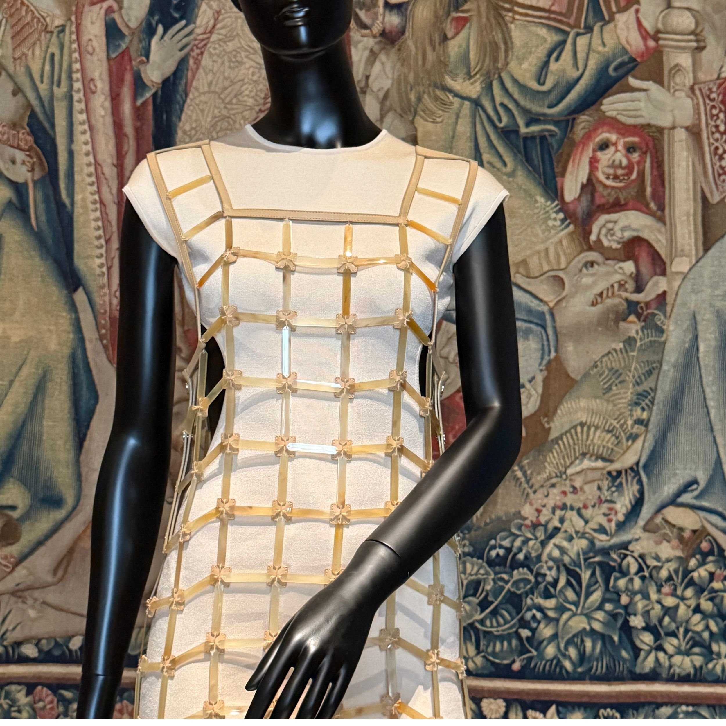 Hermès horn and lambskin dress by Nadège Vanhée from 2021 displayed at the Louvre Couture exhibition