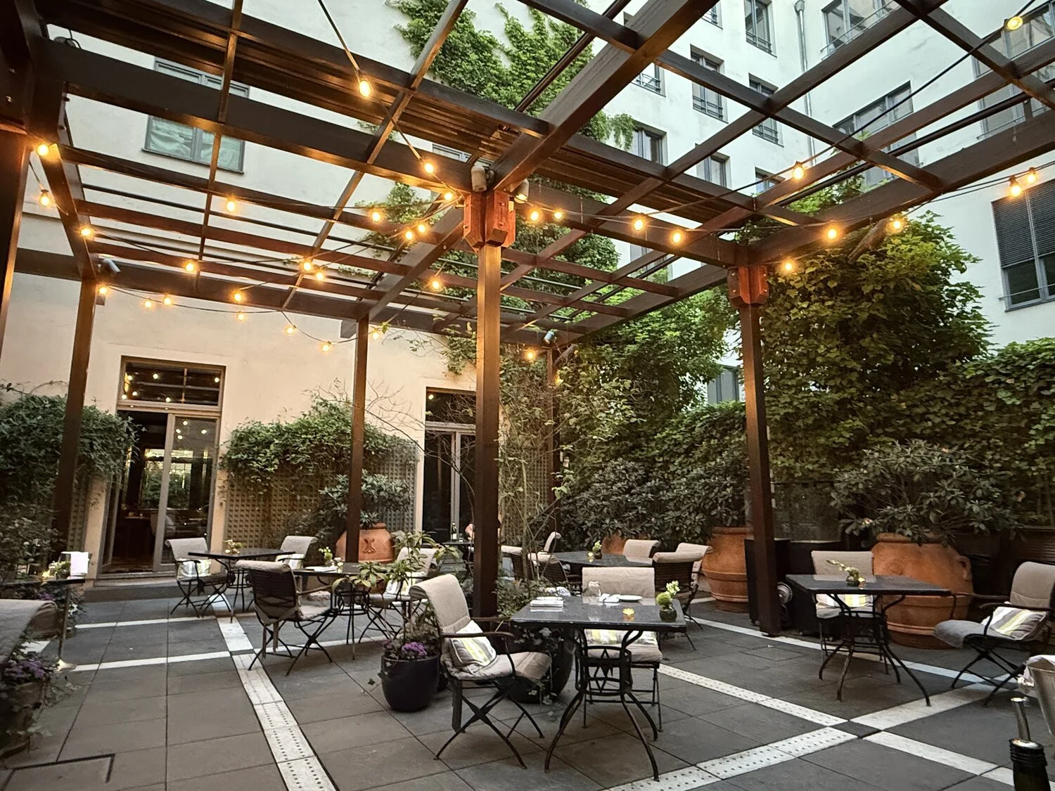 Dining on the terrace at sunset in the Hotel de Rome