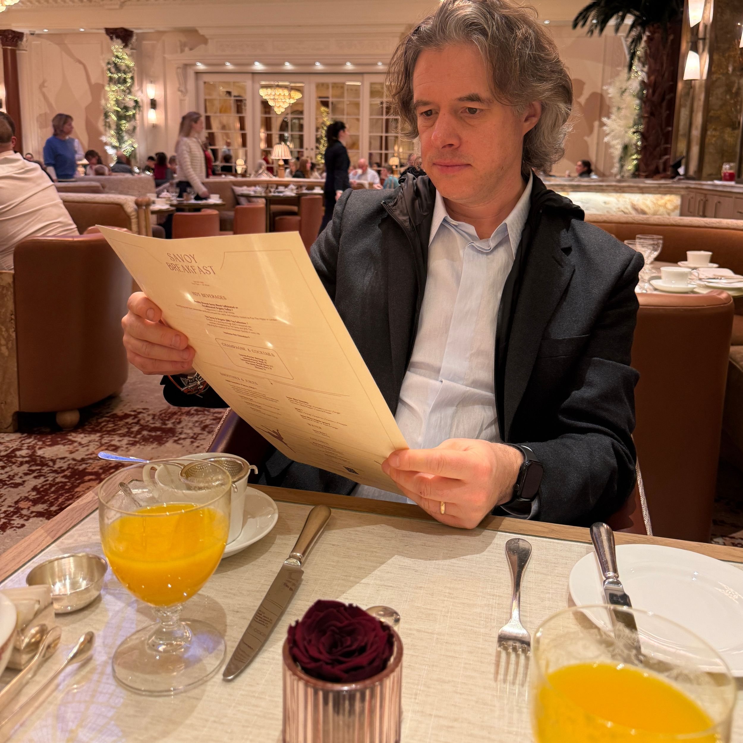 Jamie surveys the breakfast menu at the Savoy