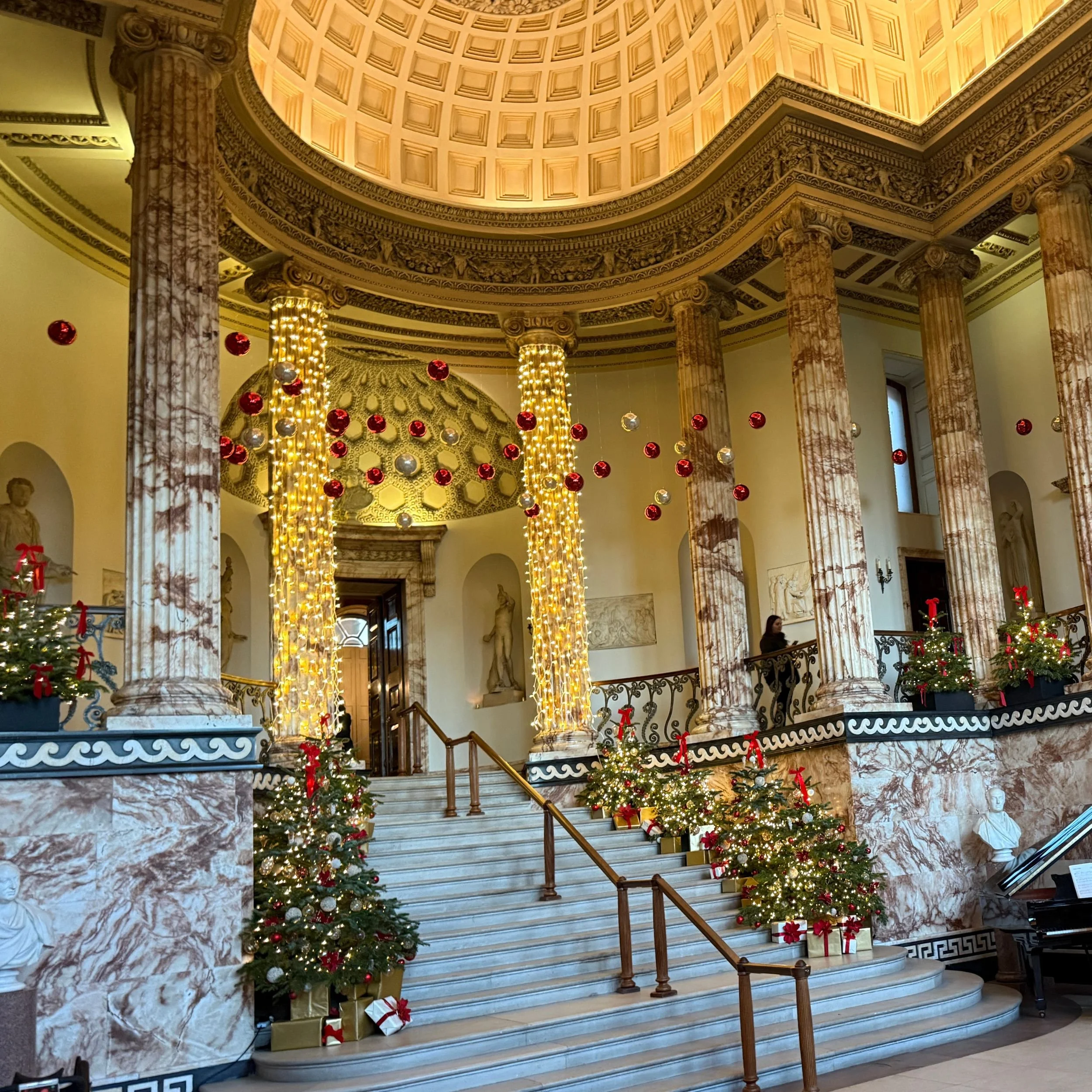 The Grand Staircase and Columns at Holkham Hall Decorated for Christmas 2025