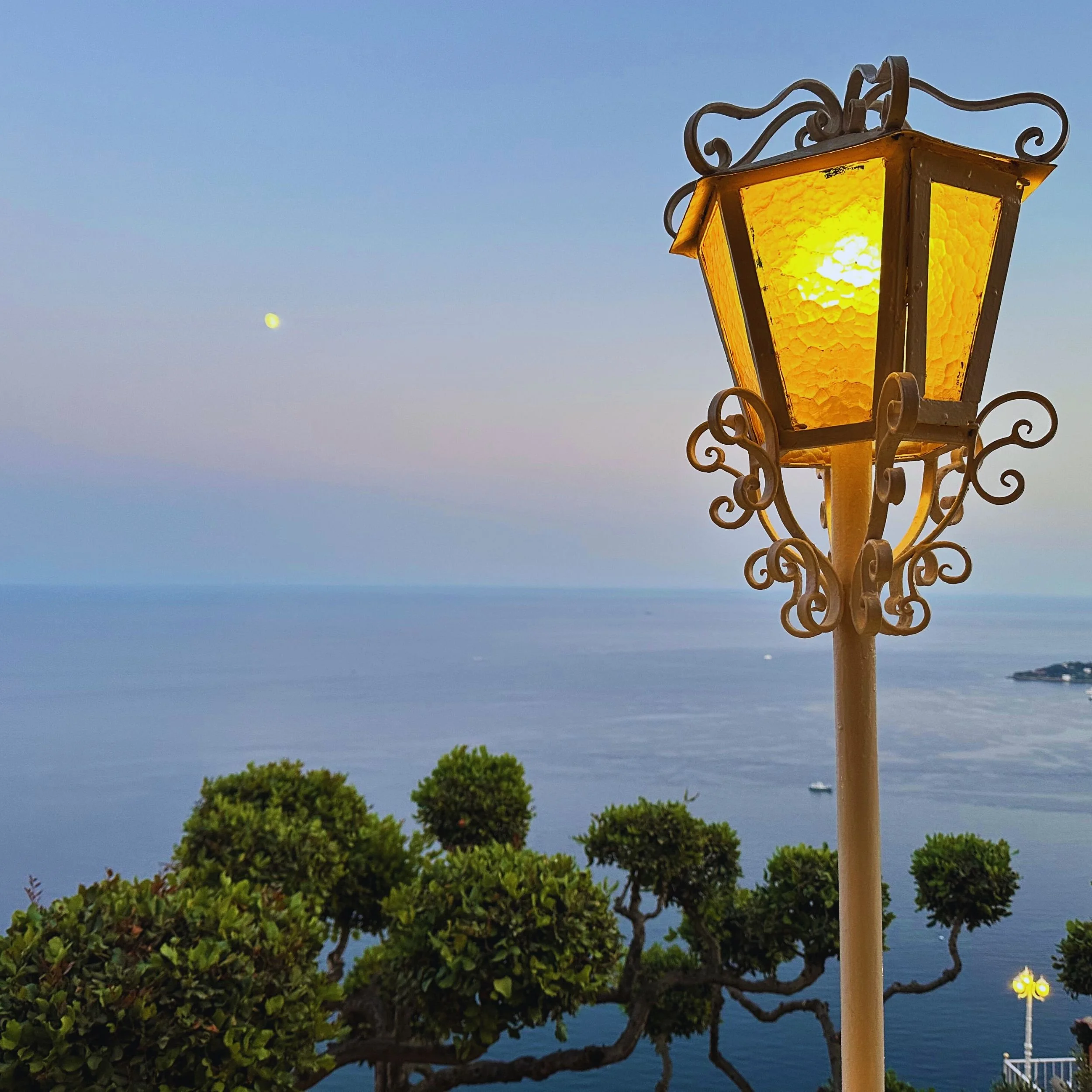 Moon rising over the Mediterranean from Les Remparts terrace at Château de la Chèvre d’Or in Èze