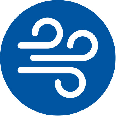 A blue circular sign with a white wind symbol, indicating wind or air movement.