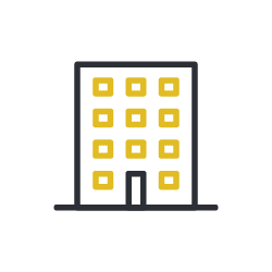A multi-story office building with yellow and black exterior, featuring multiple windows and a central entrance.