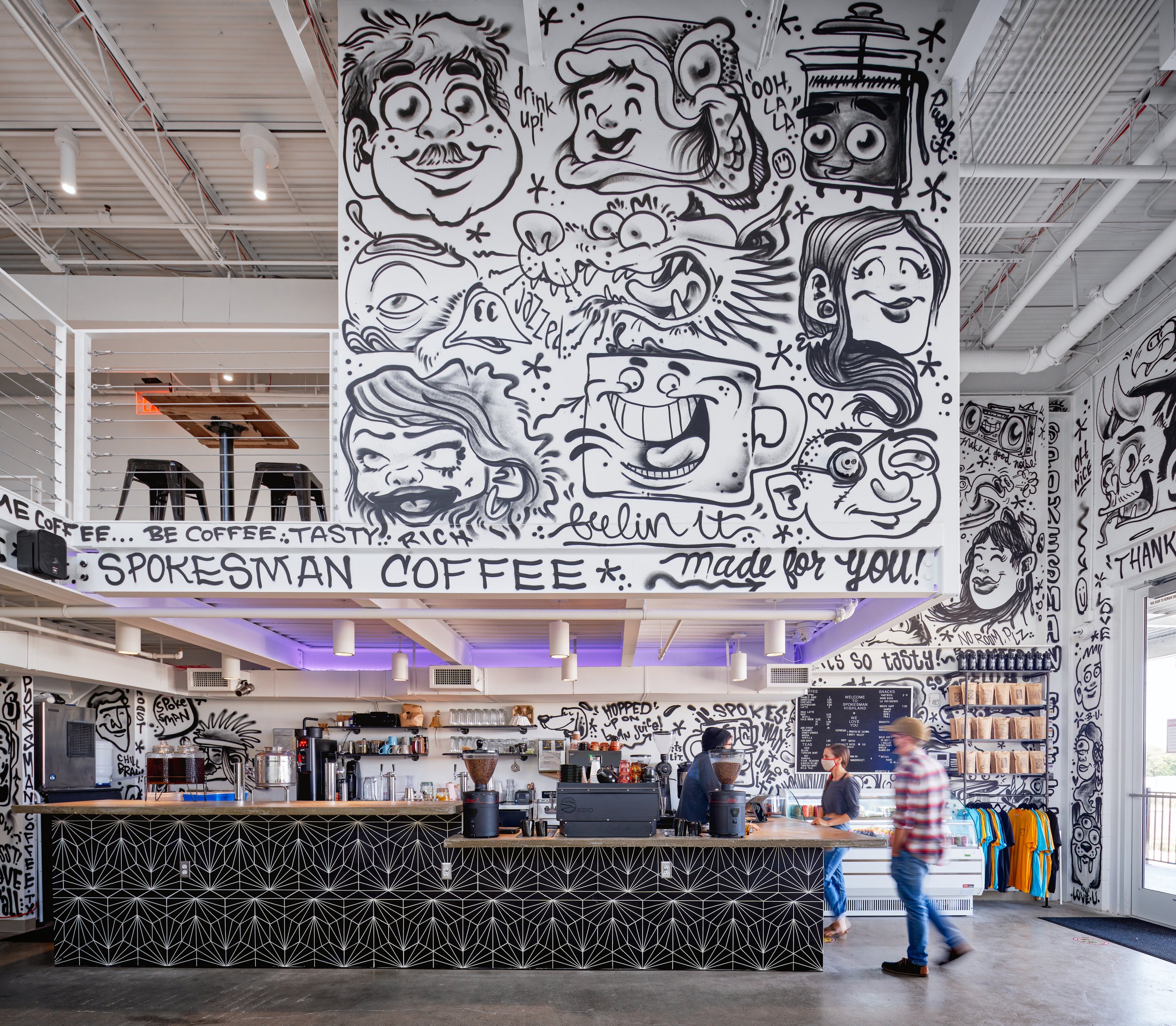 Spokesman Coffee brings a playful energy to Crux Central, with bold hand-drawn murals (brikslovesyou.com), geometric tilework, and a visual connection to the climbing gym beyond.