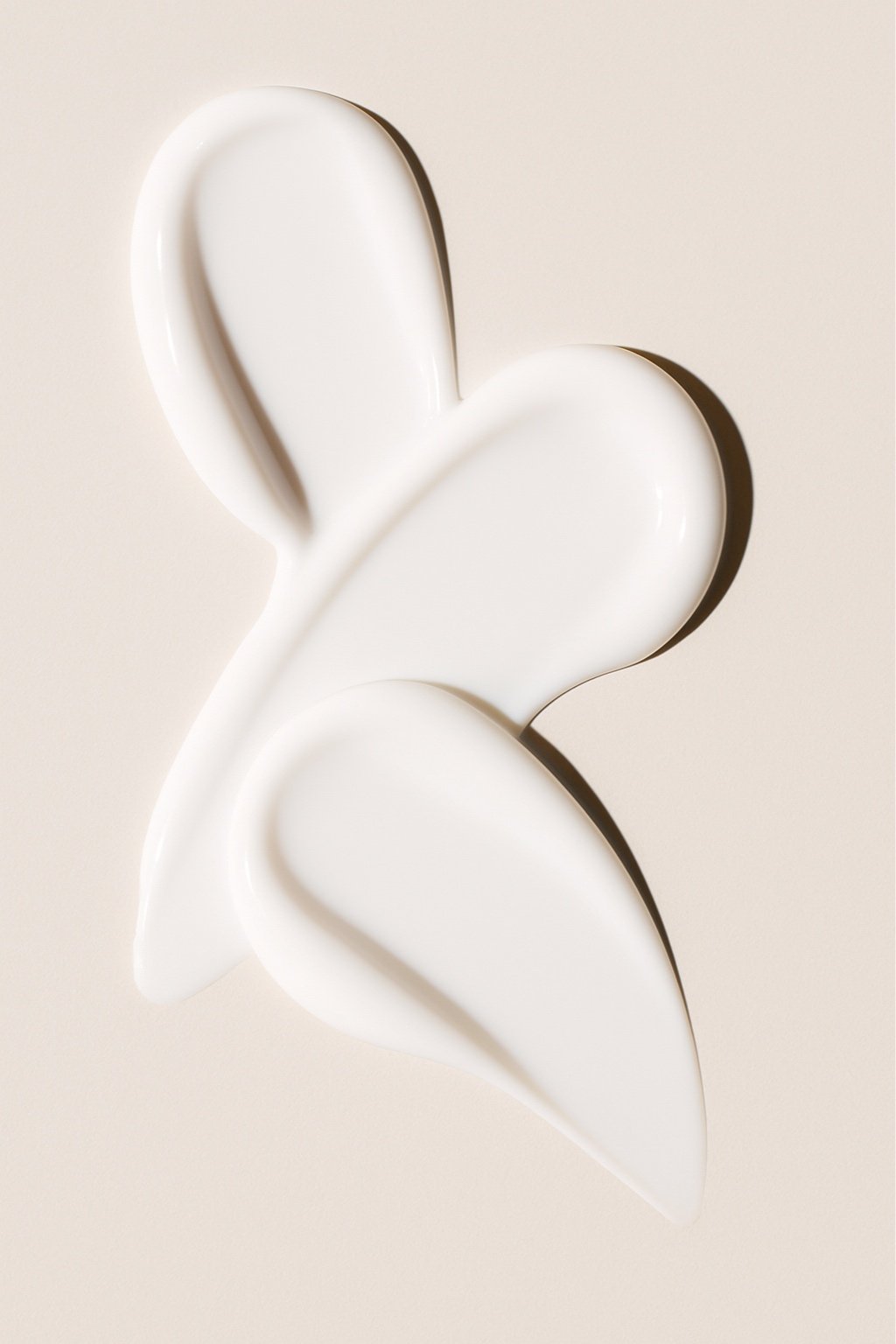 Minimalist image of skincare cream on a neutral background, reflecting Valere Medical Aesthetics’ focus on clinically refined, evidence-based skin treatments