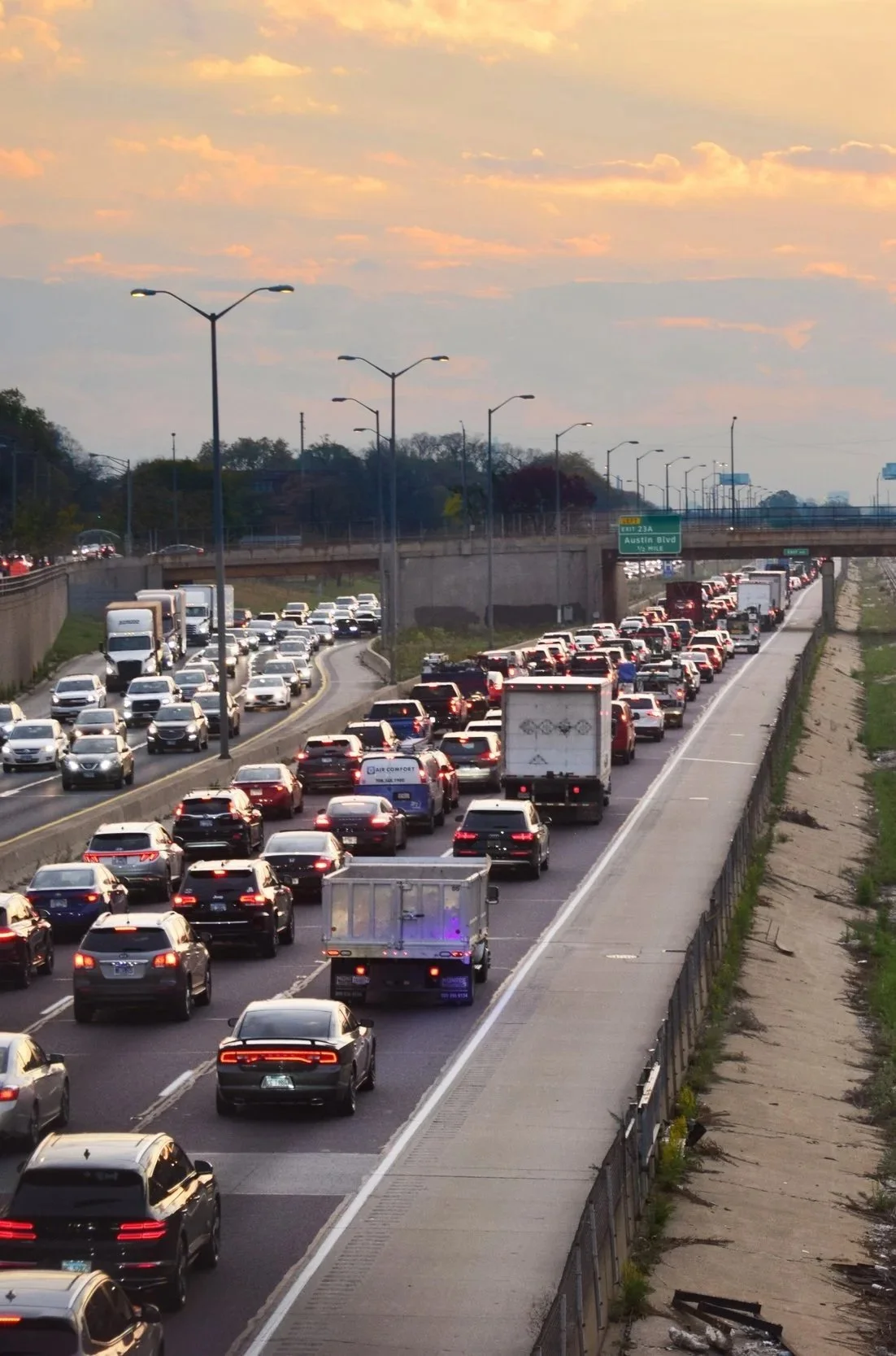 Steady flows of traffic travel in both directions on I-290