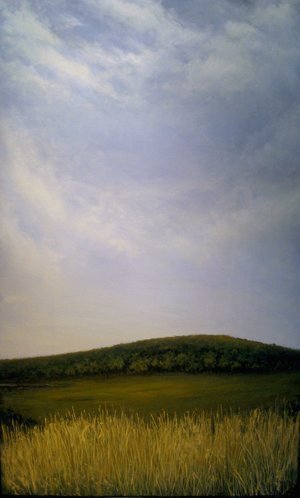 A landscape scene with a grassy field in the foreground, a green hill in the middle ground, and a cloudy sky overhead.