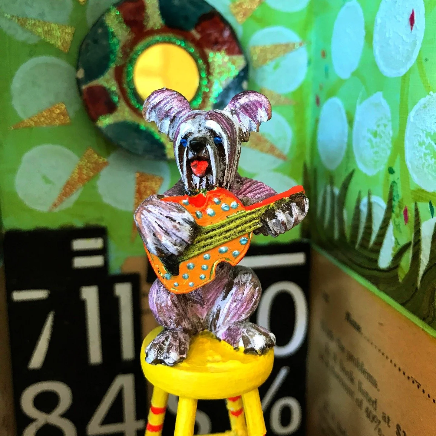 &quot;Adding Up&quot; also found a home in October - I made this around tax time a few years ago. I love the way the quote from David Whyte plays with the image of the musician dog, happily playing in the grass - even if he has to perch precariously 