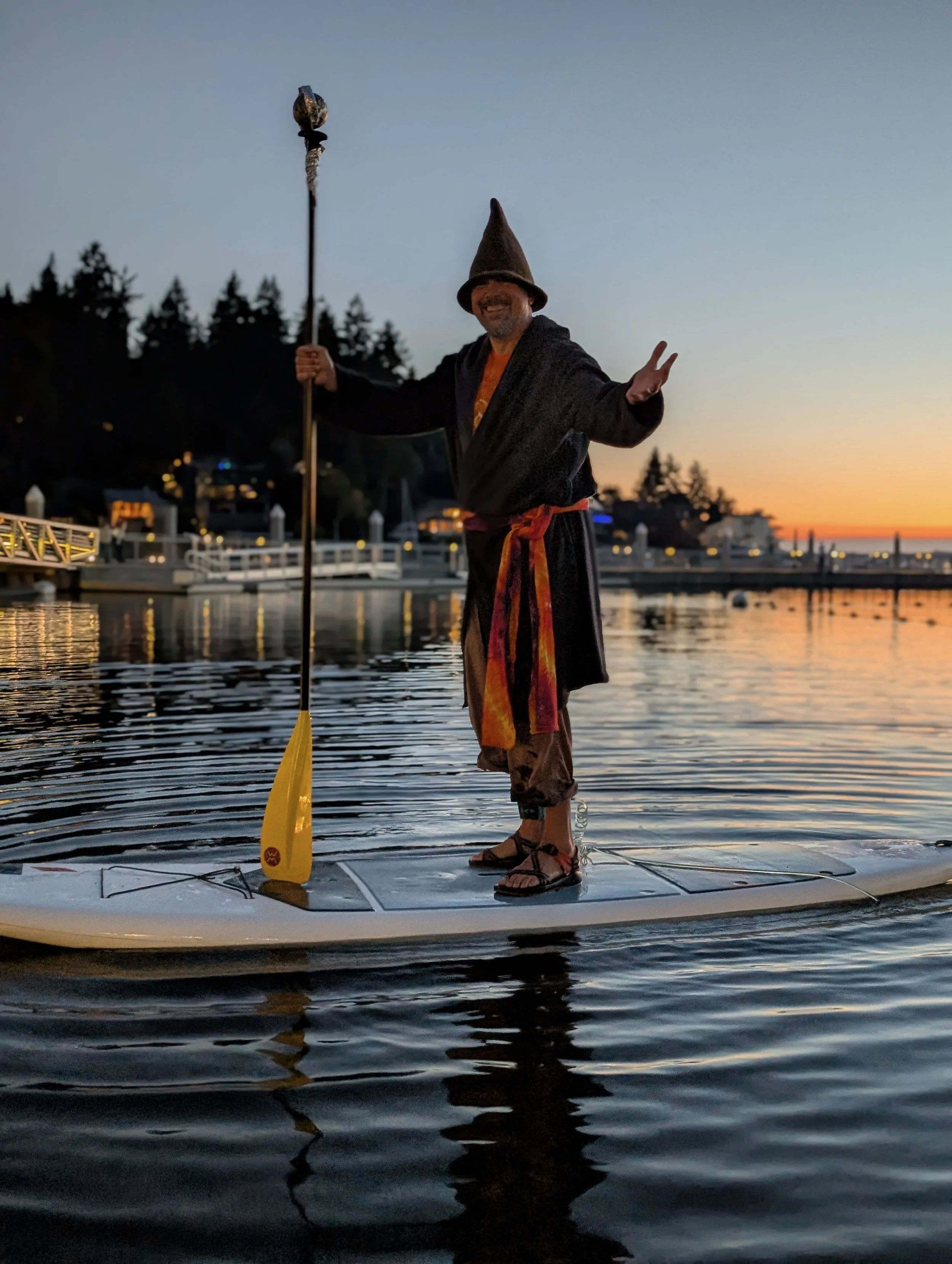 a wizard on a paddleboard