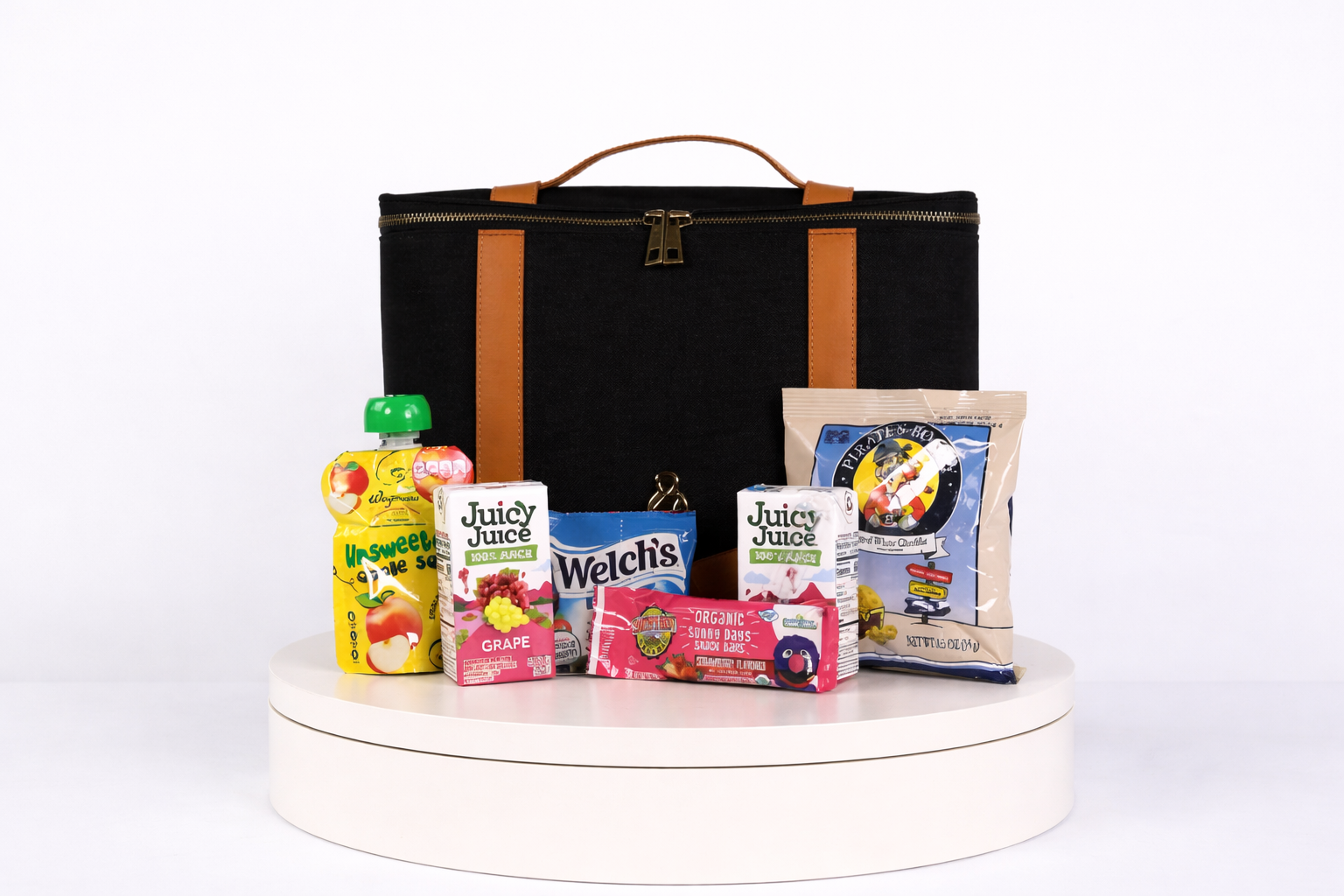 The Little Hauler Insulated Pod, part of the modular pod with various snack and beverage items, showcasing it's use as an insulated snack and lunch box.