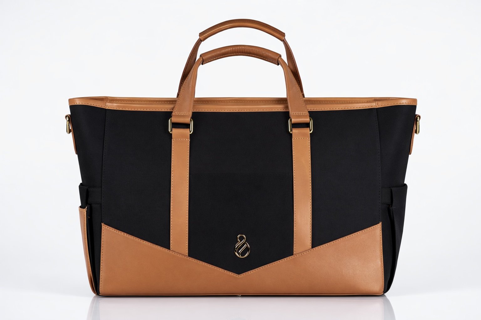 The Little Hauler tote in black coated canvas with leather trim