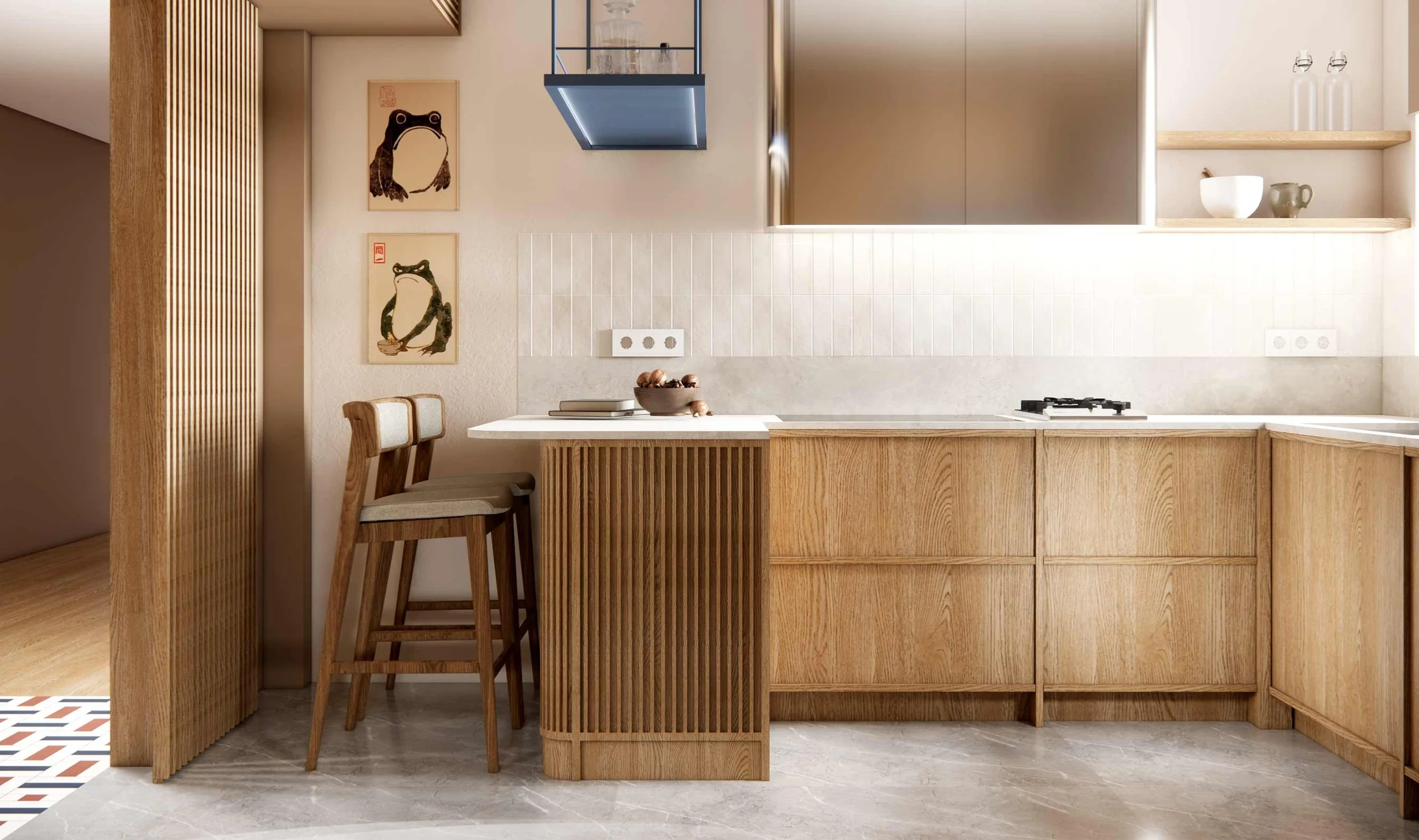 Modern kitchen with wooden cabinets, two bar stools, and wall art of frogs, with a white countertop and a cooktop.