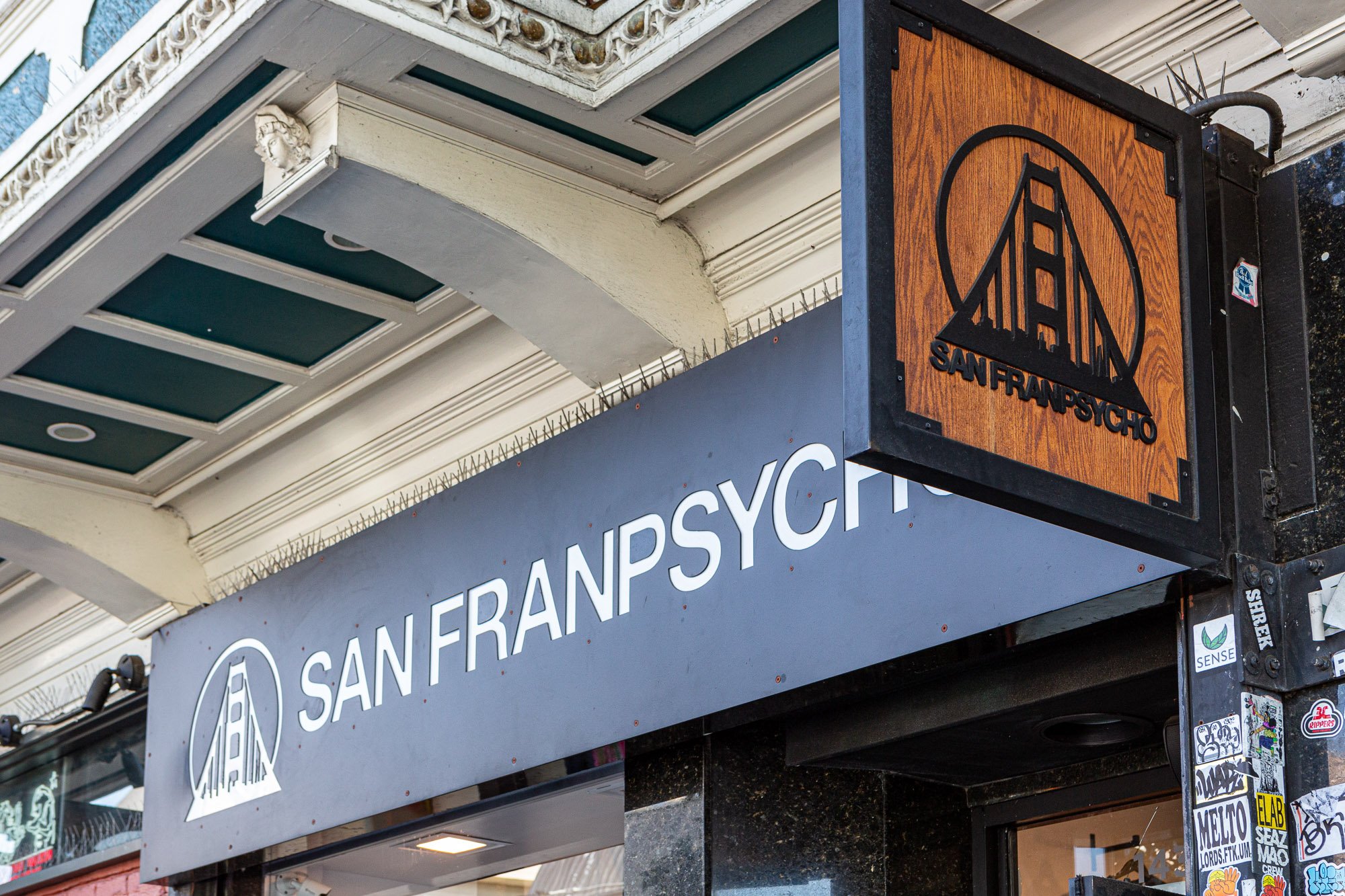 San Franpsycho store sign with Golden Gate Bridge logo in San Francisco.