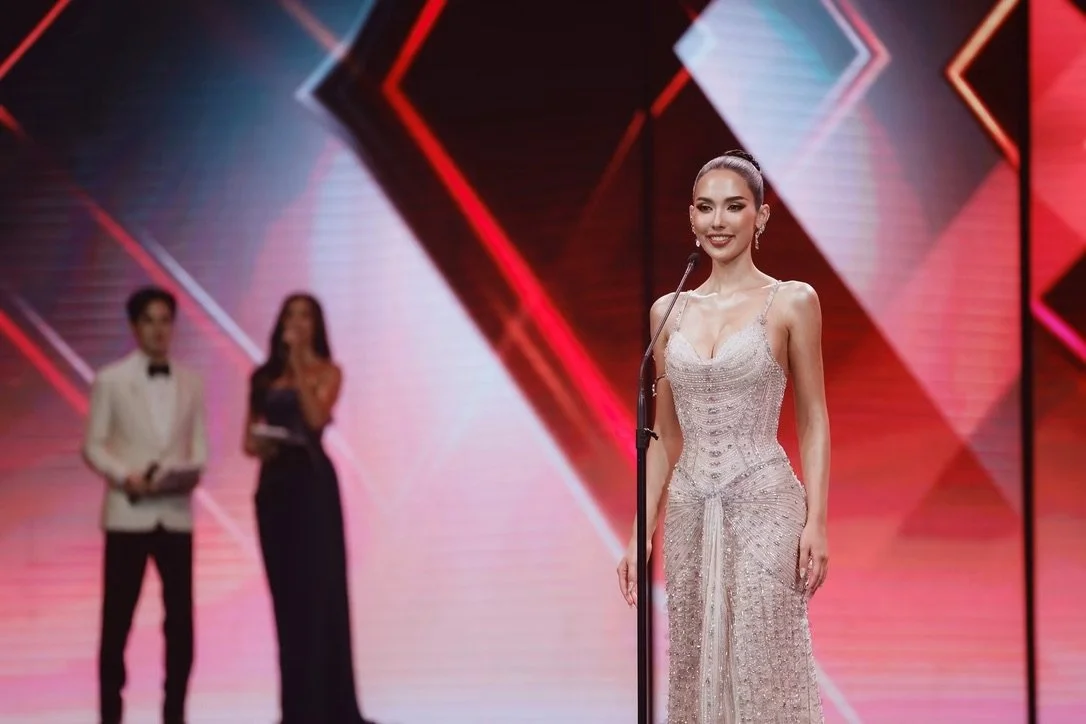 Saffron Maya Snook wearing a hand-embroidered silver-white couture gown designed by Maxy Harnsongkram of MAXY LALA for Miss Global 2026.