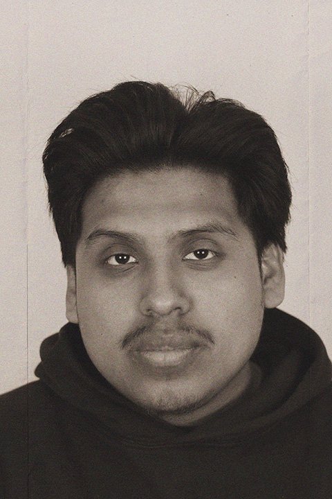 Lisandro Passport Photo Final.jpg