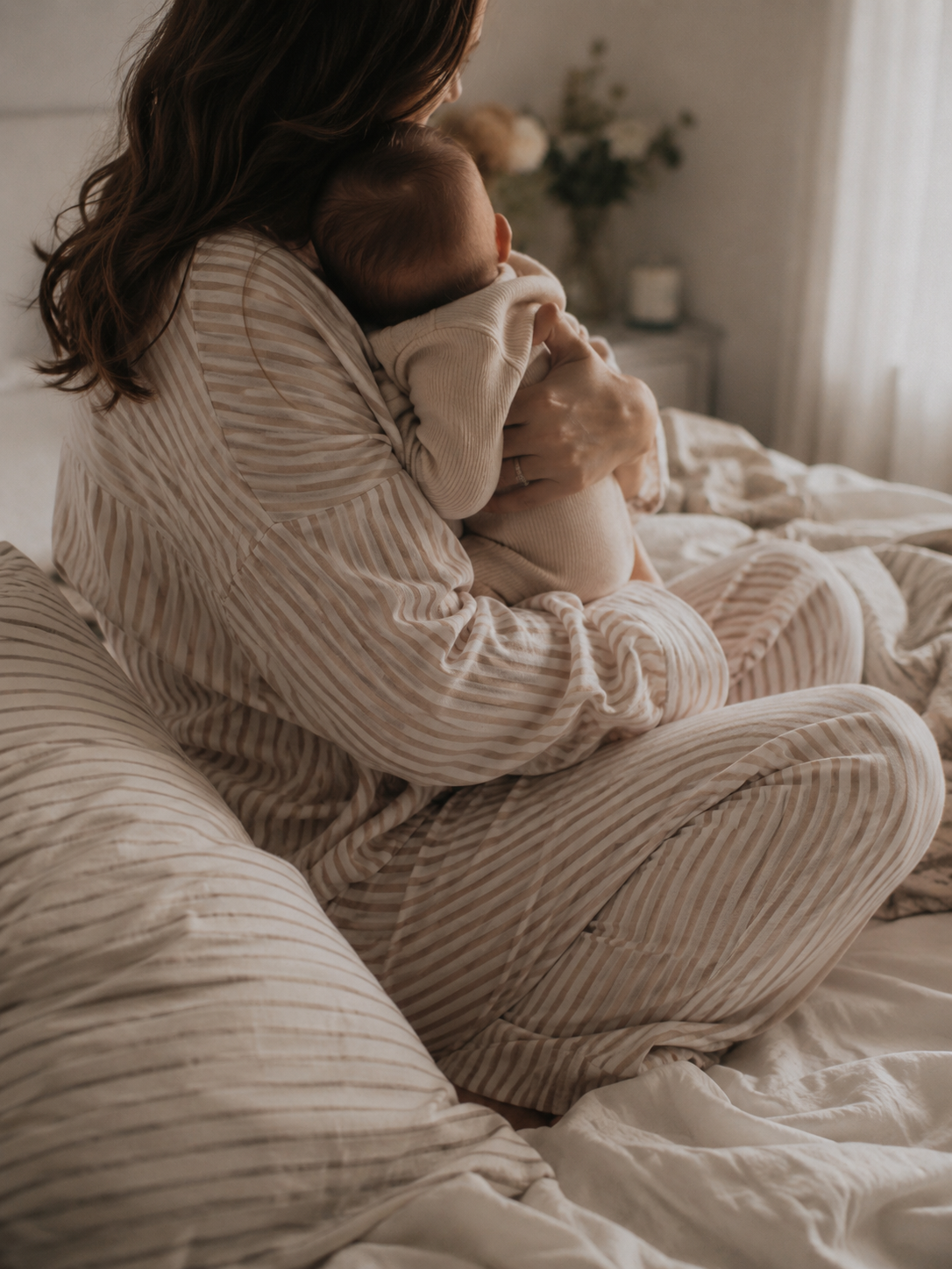 Woman nursing baby