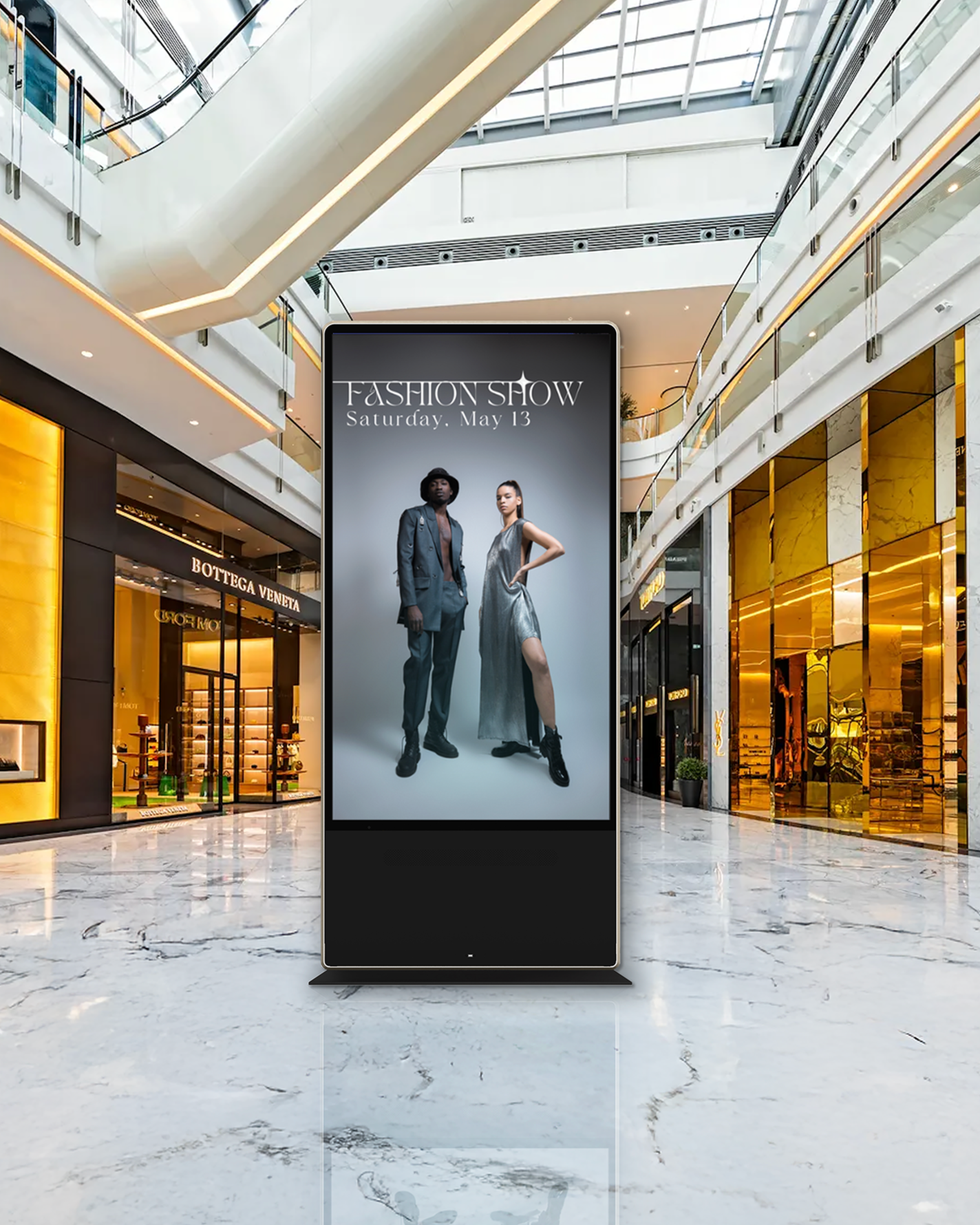 A large display kiosk in a retail mall, displaying local advertisement.