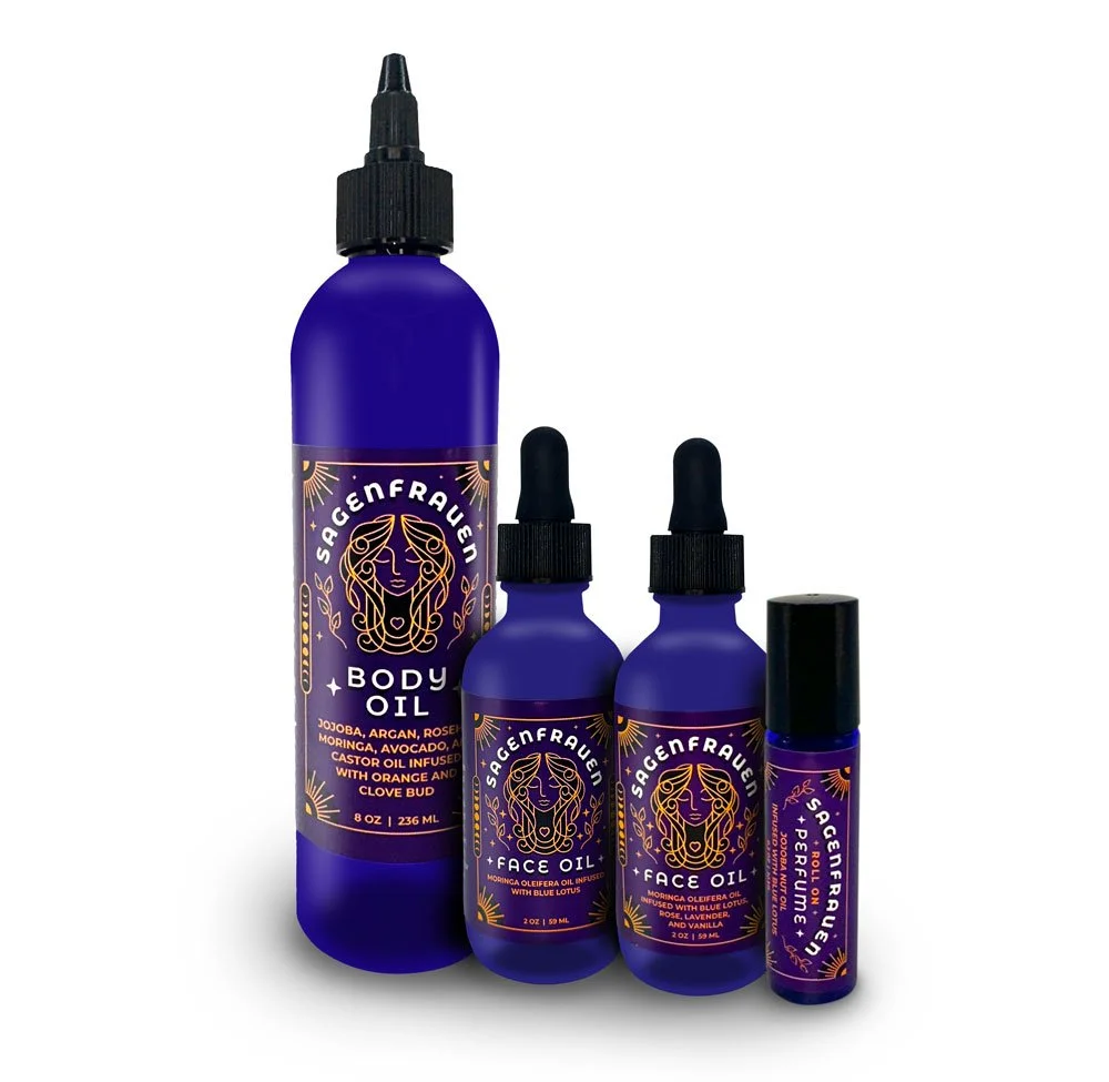 Body oil, face oil, and perfume labeled with a purple and gold design, including dropper caps and spray nozzle.