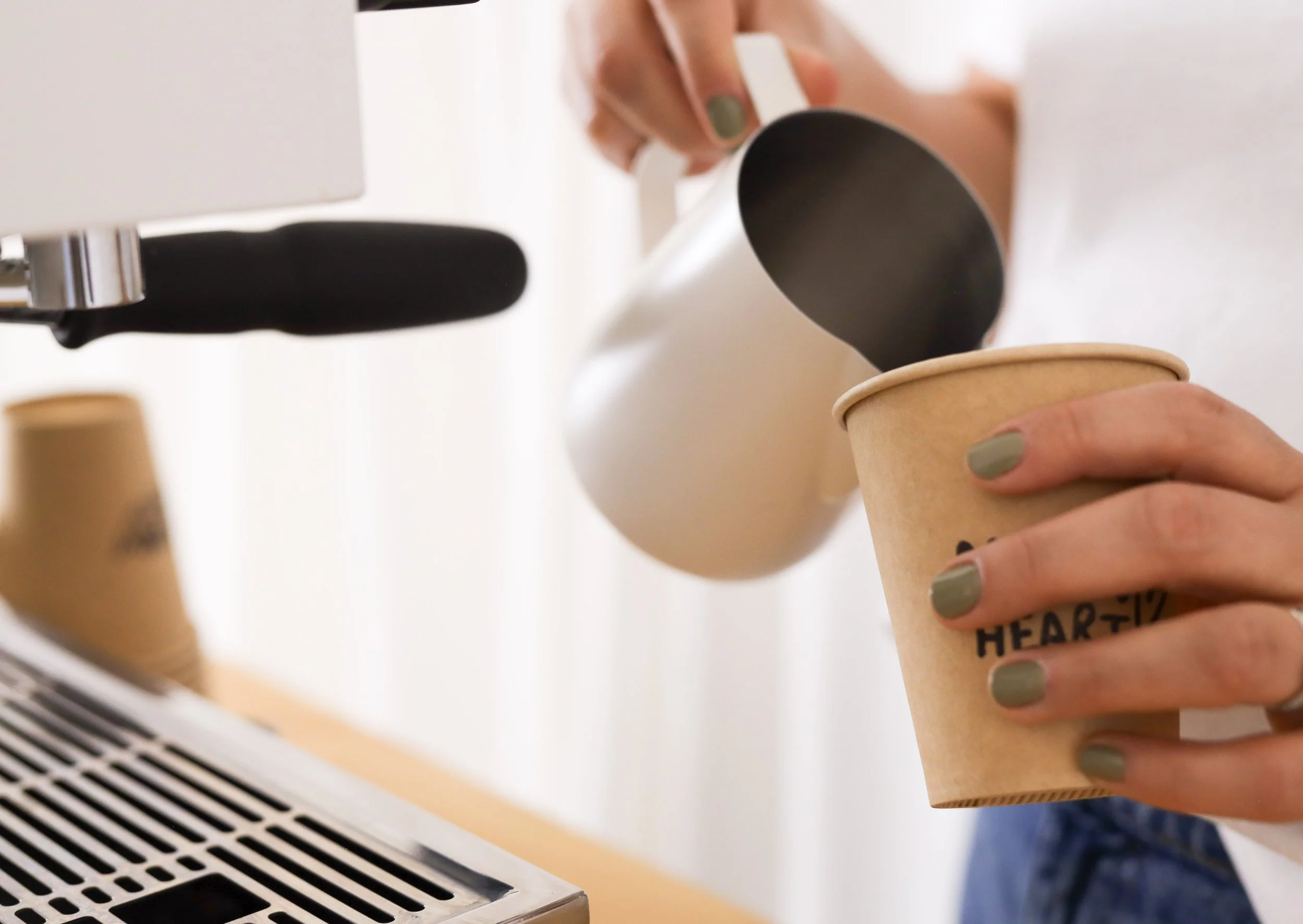 Barista serving espresso drinks from Boise Idaho coffee cart