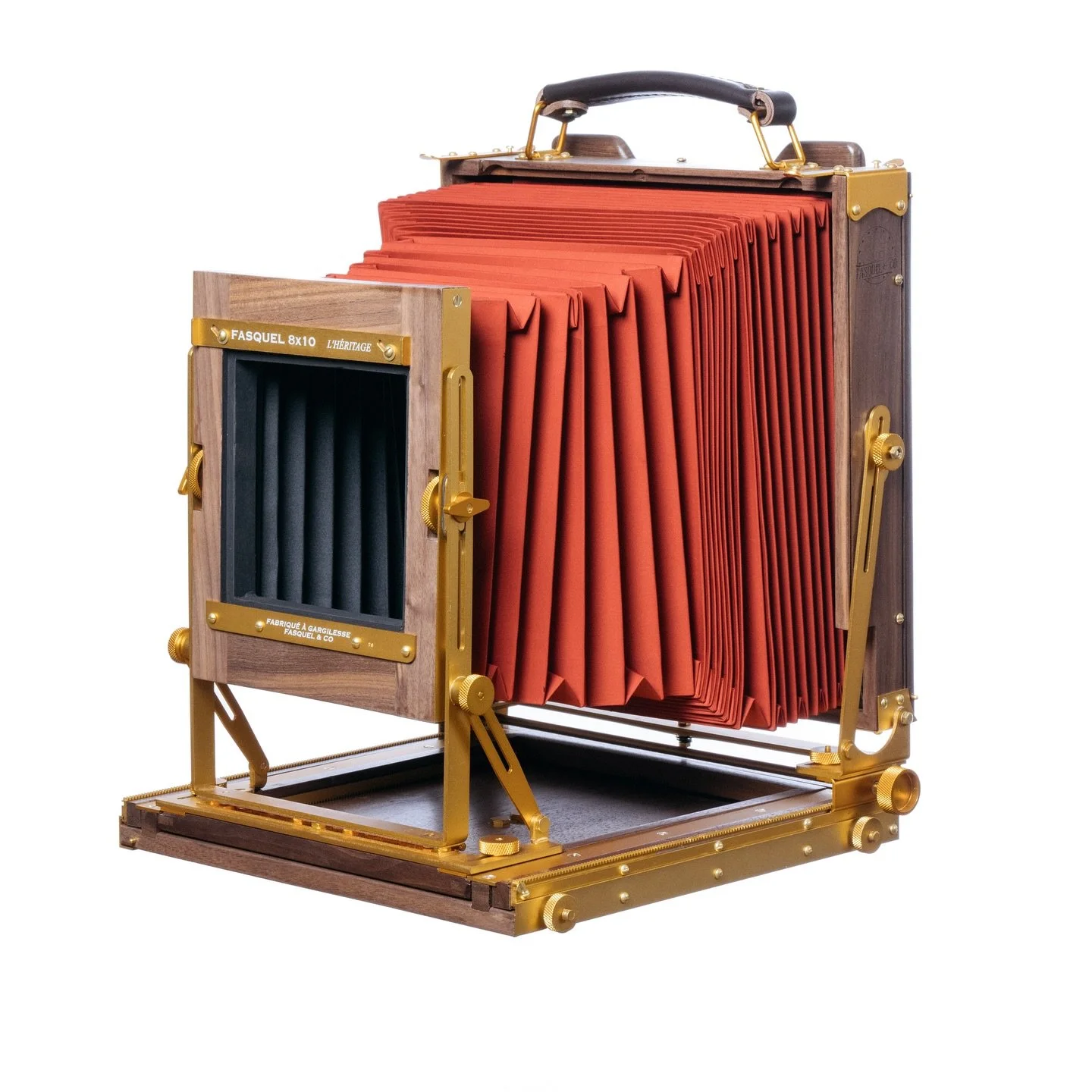 Walnut. Gold aluminium. Red bellows.

The 8&times;10 Heritage by Fasquel &amp; Co. is a handcrafted large format camera built in France using carefully selected woods and precision metal parts. Designed for photographers who still believe in slow ima