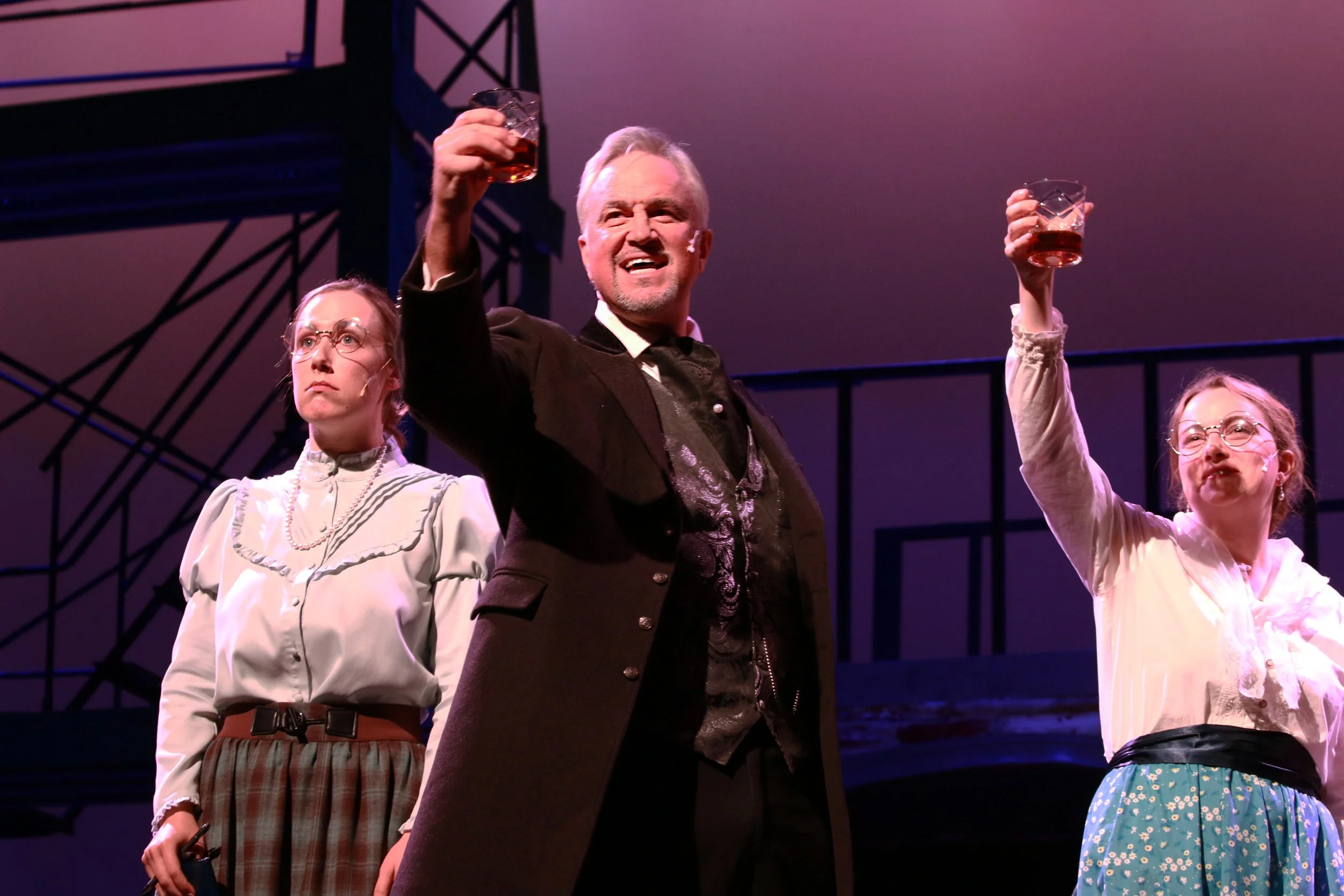 Pulitzer raises a glass copy.jpg