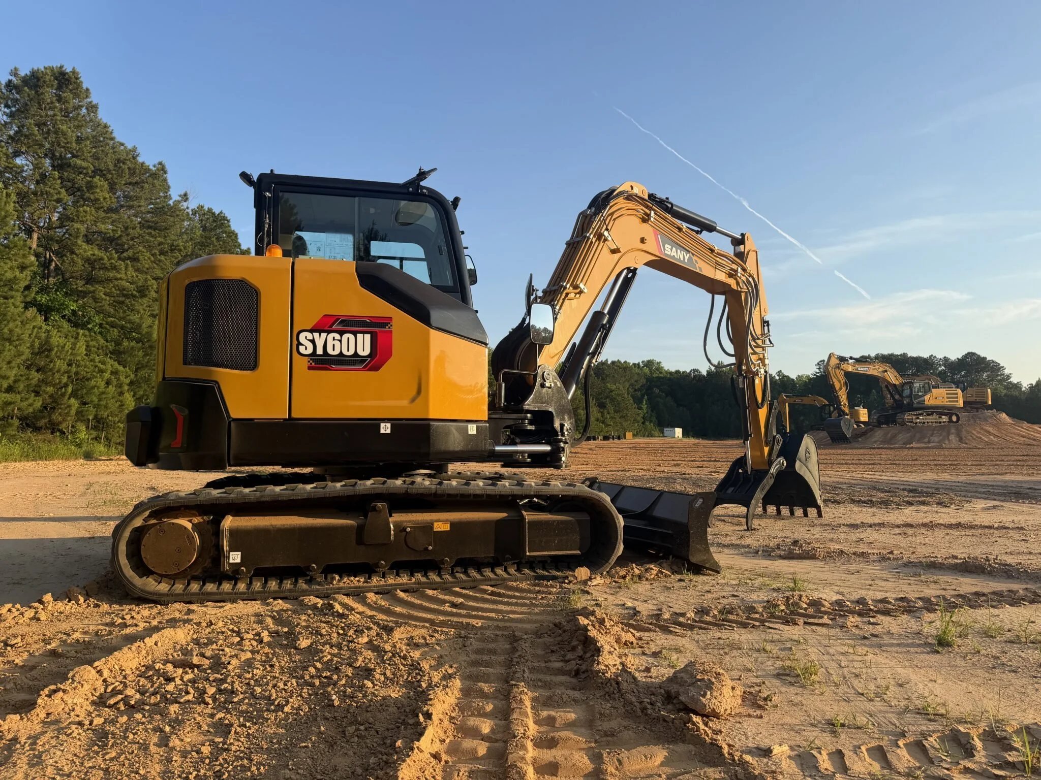  SANY SY60U GEN2 Excavator Bundle - Hydraulic Pin Grabber Coupler, Thumb, 2 Buckets - IN STOCK!  
 0% AND OTHER FINANCING OPTIONS AVAILABLE, CONTACT US FOR QUOTE (Financing subject to approval)  The SANY SY60U Gen 2 delivers powerful six-ton-class pe