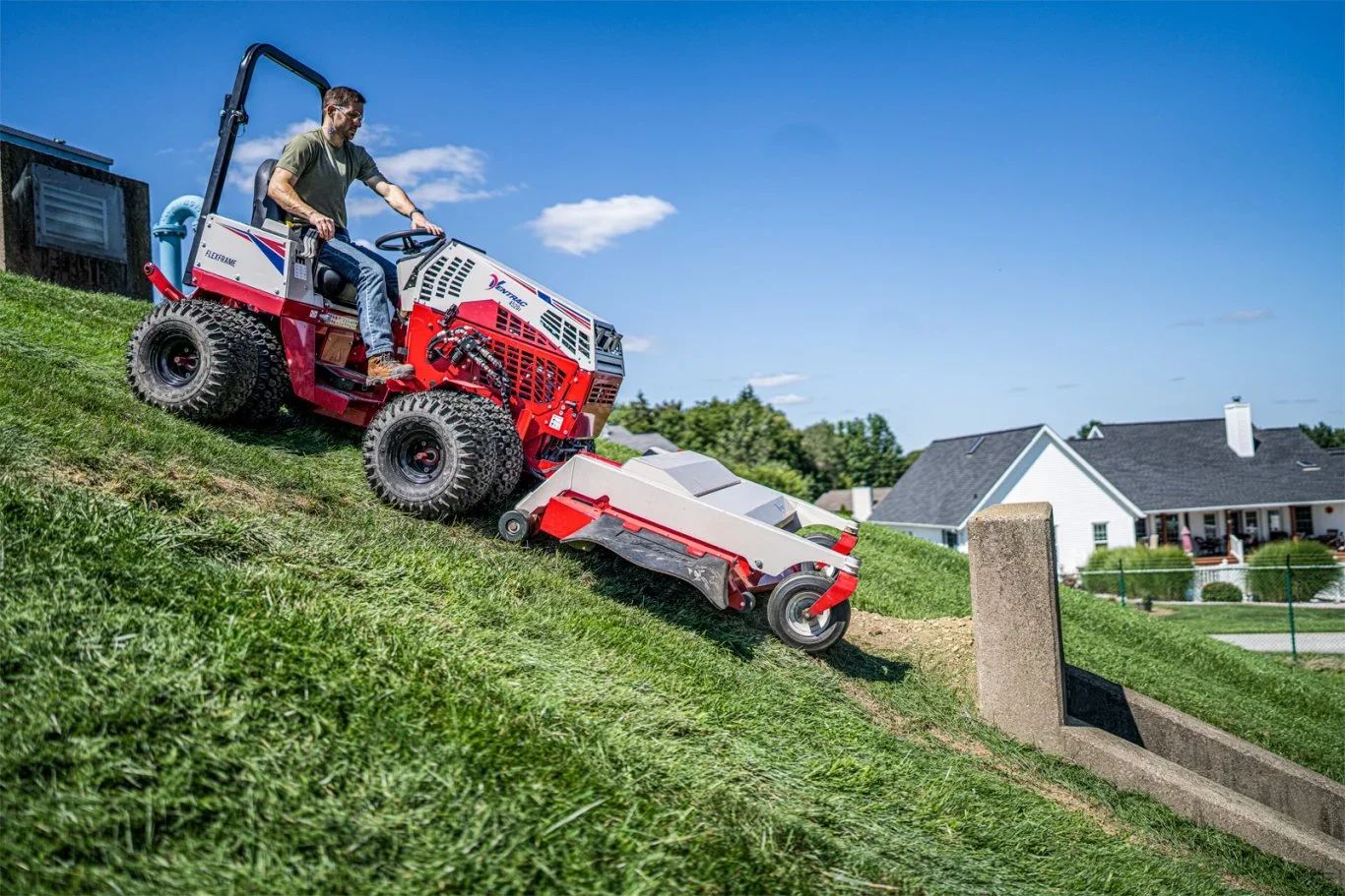 riding mower with lawn attachment going down hill 