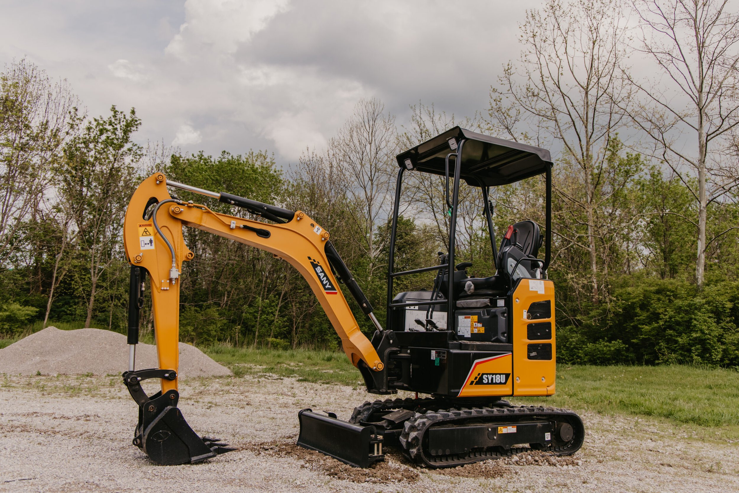 SANY SY18U Excavator Bundle - Coupler, Thumb, 2 Buckets - IN STOCK!  
 0% AND OTHER FINANCING OPTIONS AVAILABLE, CONTACT US FOR QUOTE (Financing subject to approval)  
Compact, capable and easy to transport, the SANY SY18U is built to bring serious 