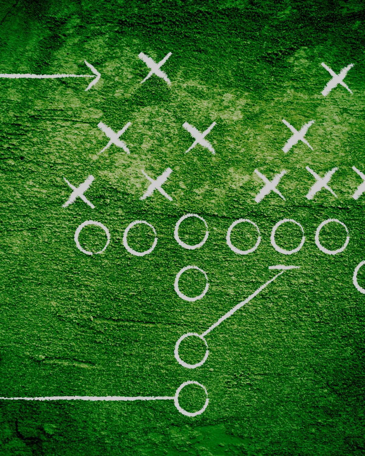 A football play diagram drawn on a green field, showing X's and O's with white lines indicating player positions and movements.