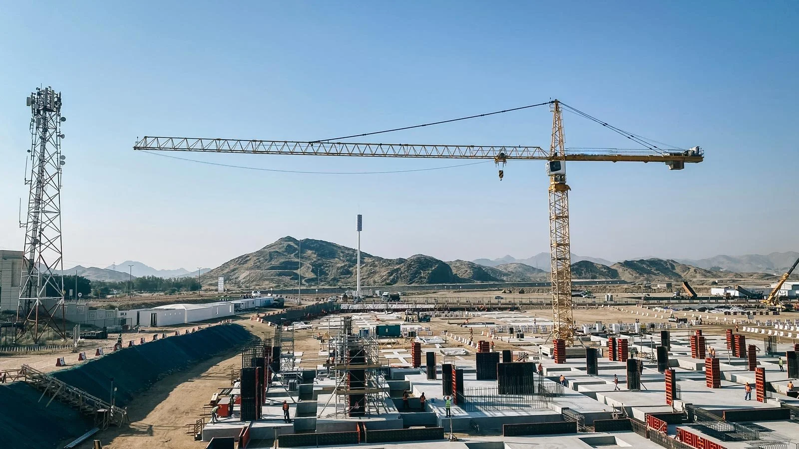 Large construction site with a tower crane