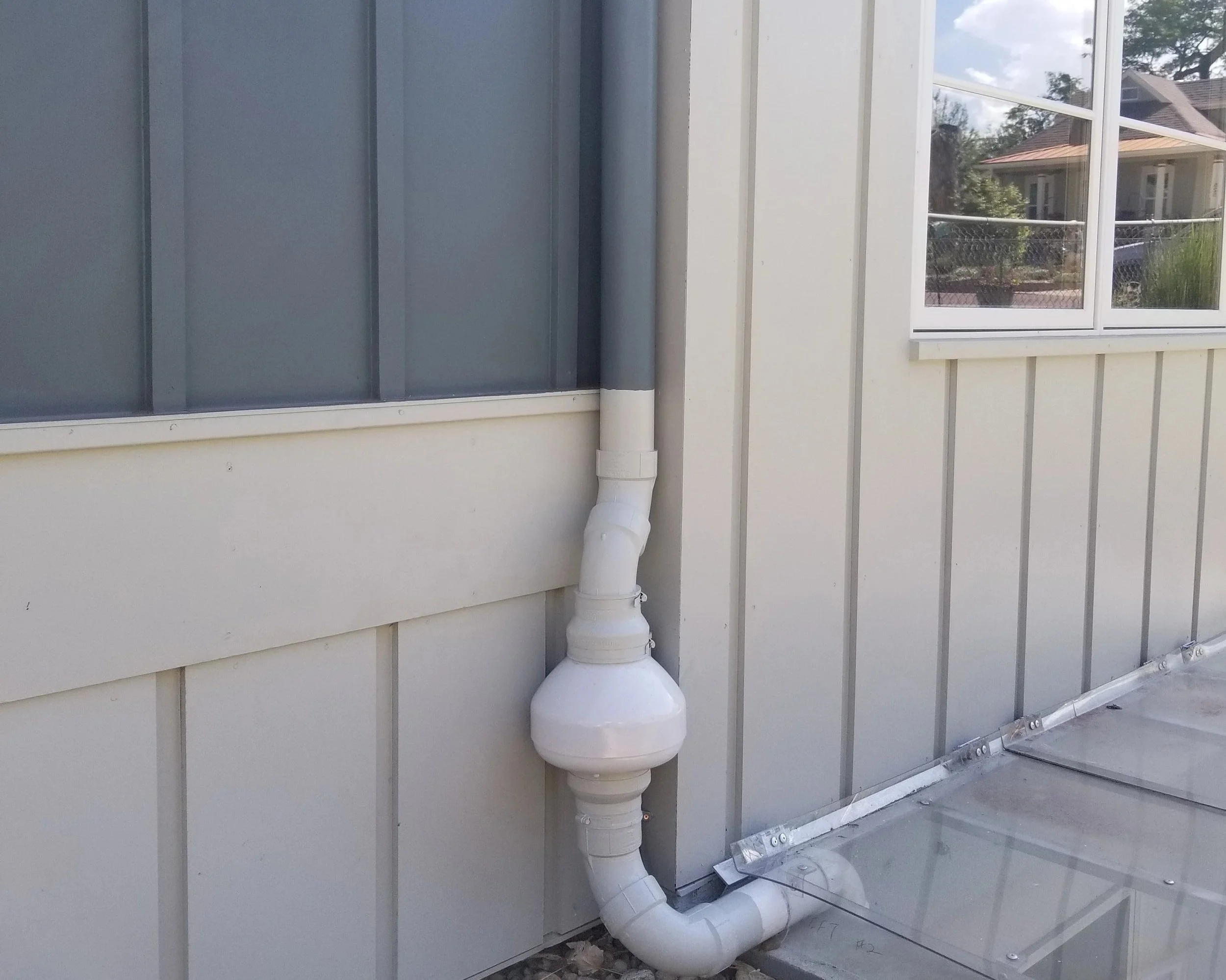 A radon system paint-matched to the home