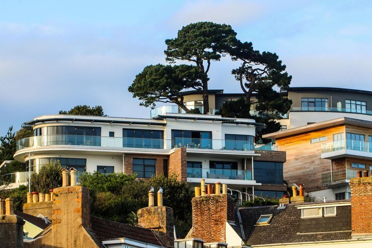 low-angle-view-trees-buildings-against-sky_1048944-1250730.jpg
