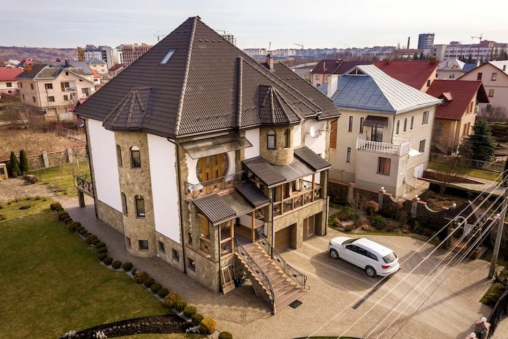 new-expensive-white-car-parked-paved-well-kept-yard-with-green-lawn-decorative-bushes-brick-fence-big-two-story-house-luxury-prosperity-concept_127089-9313.jpg
