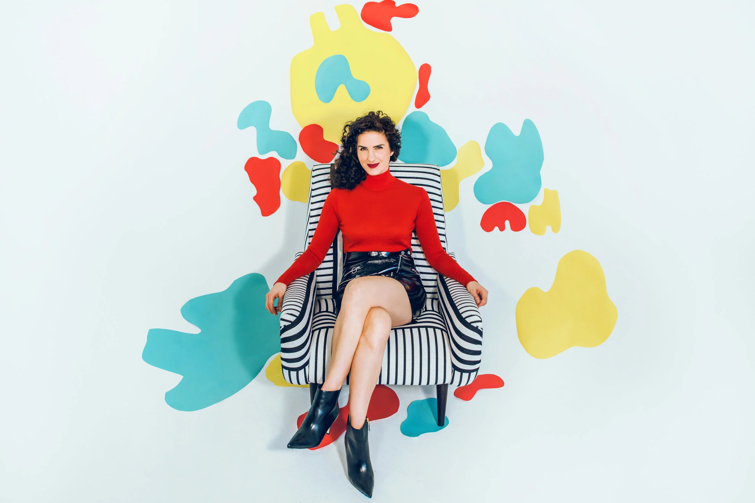 2017-Promo-Photo-red-top-in-chair-hi-res.jpg