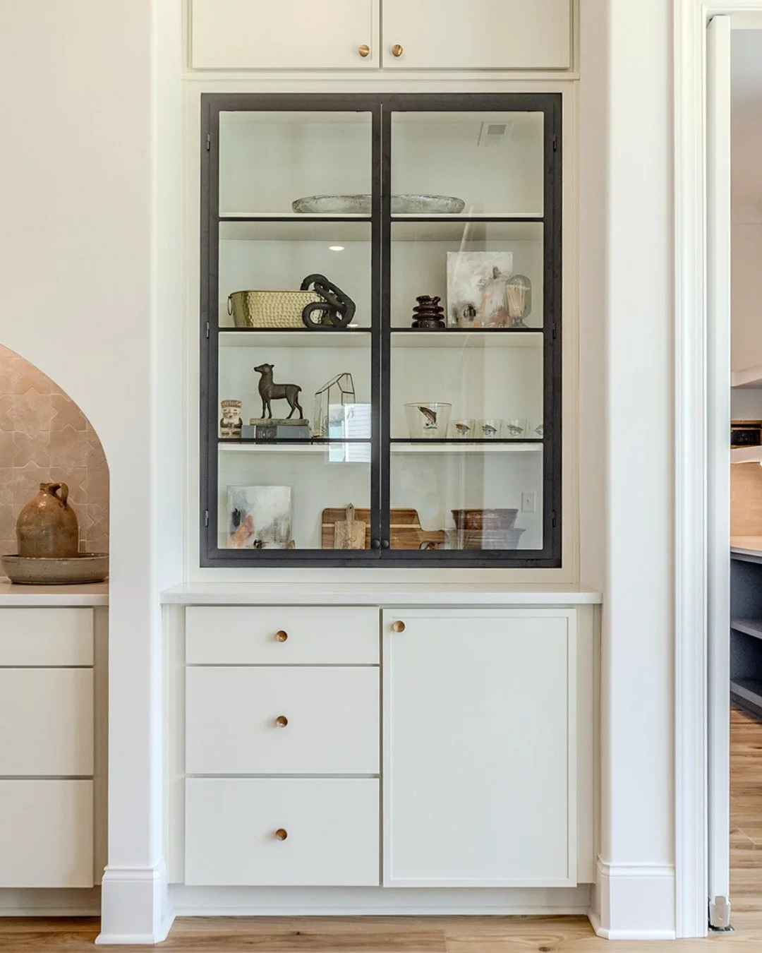 New builds do not have to feel basic. With the right details, they can feel personal from day one.

These designer statement cabinets from @stollindustries with glass doors bring a custom, collected feel to this #MassengillMade space, creating a beau