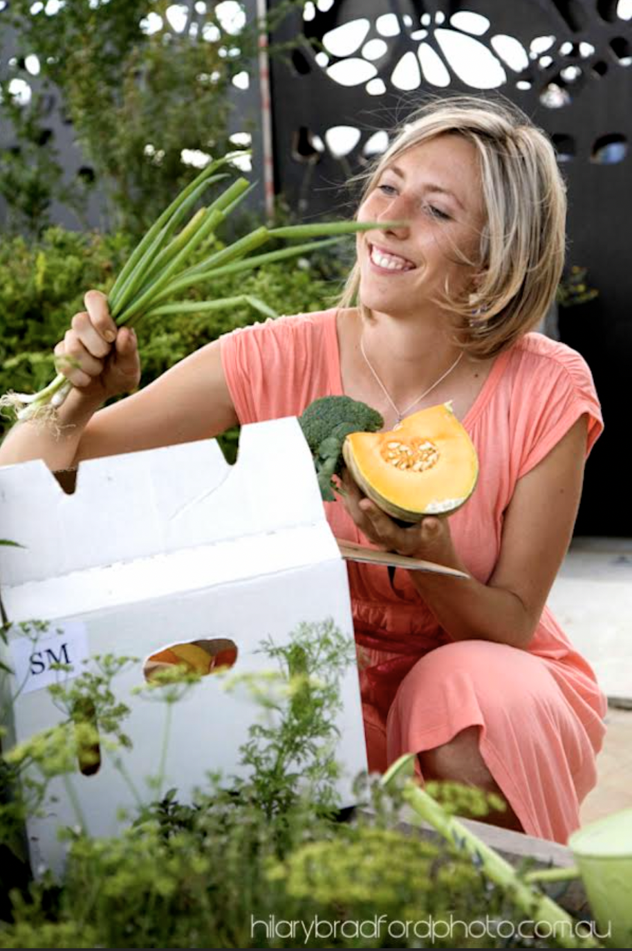 Emily with the CERES Food box in the Garden. Photography by Hilary Bradford.
