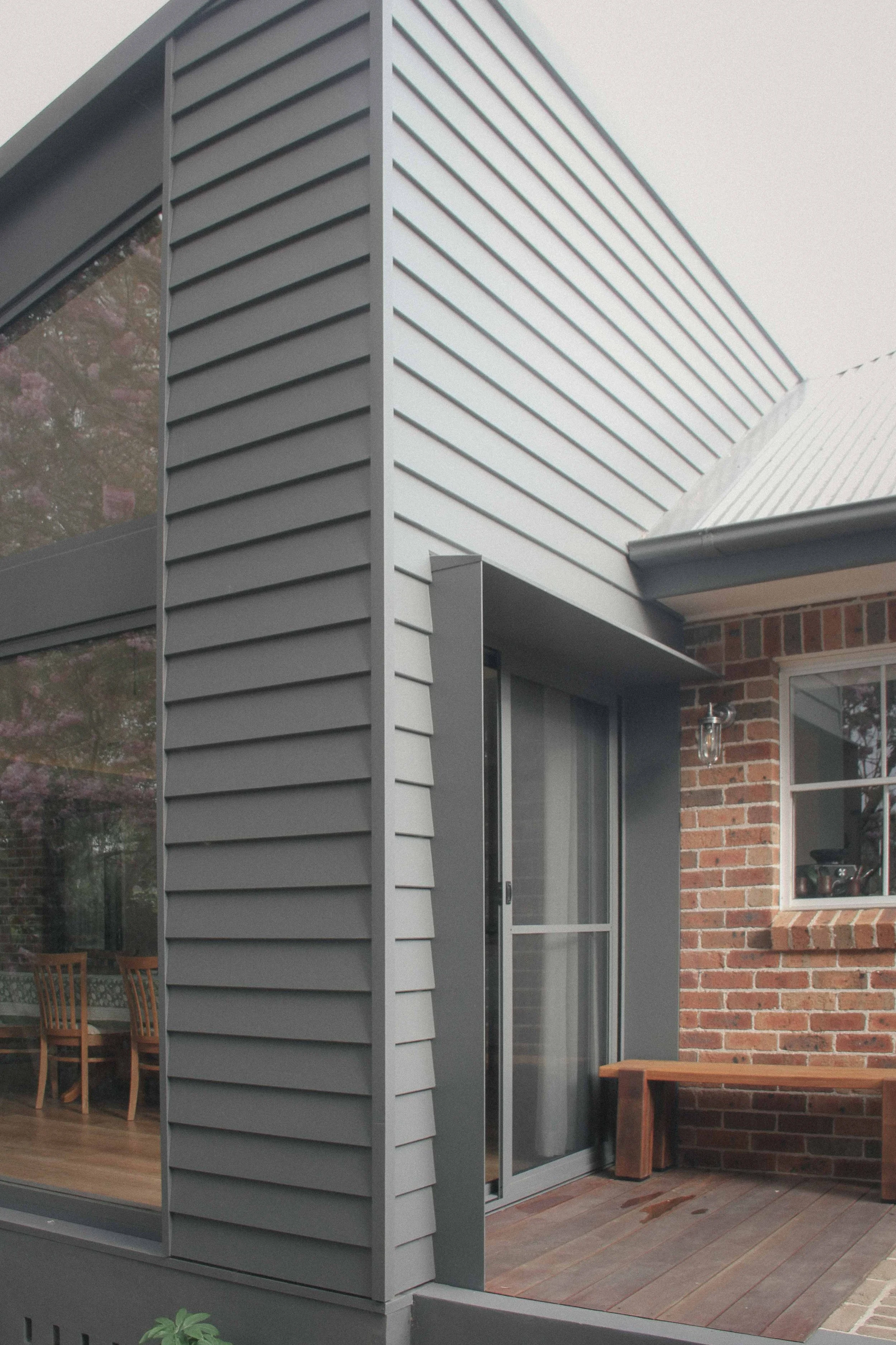 Custom steel entry Bowral Garden Room - timber deck weatherboard extension ZF Architects