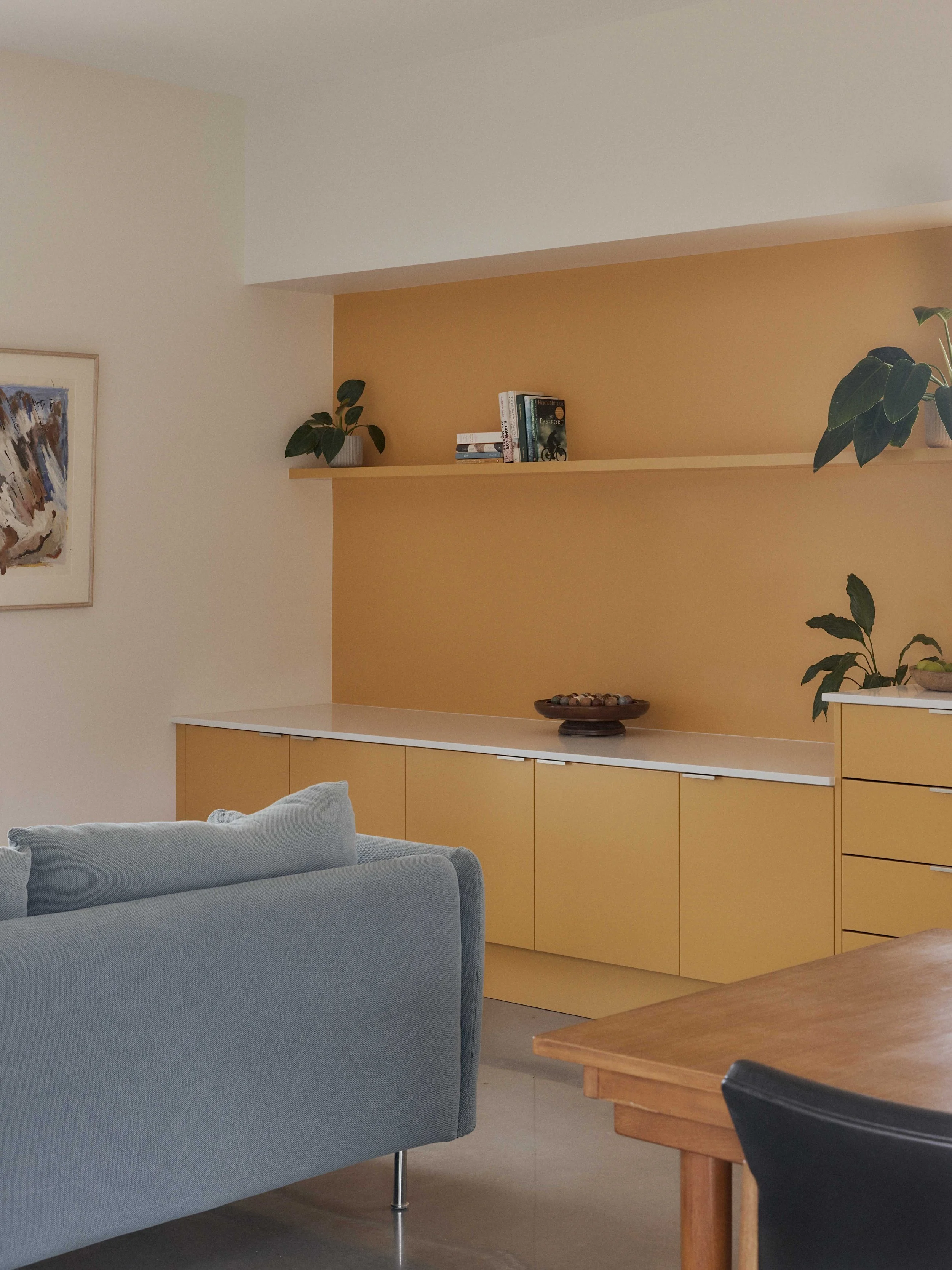 Golden yellow kitchen joinery Berrima Garden House - custom living room cabinetry ZF Architects