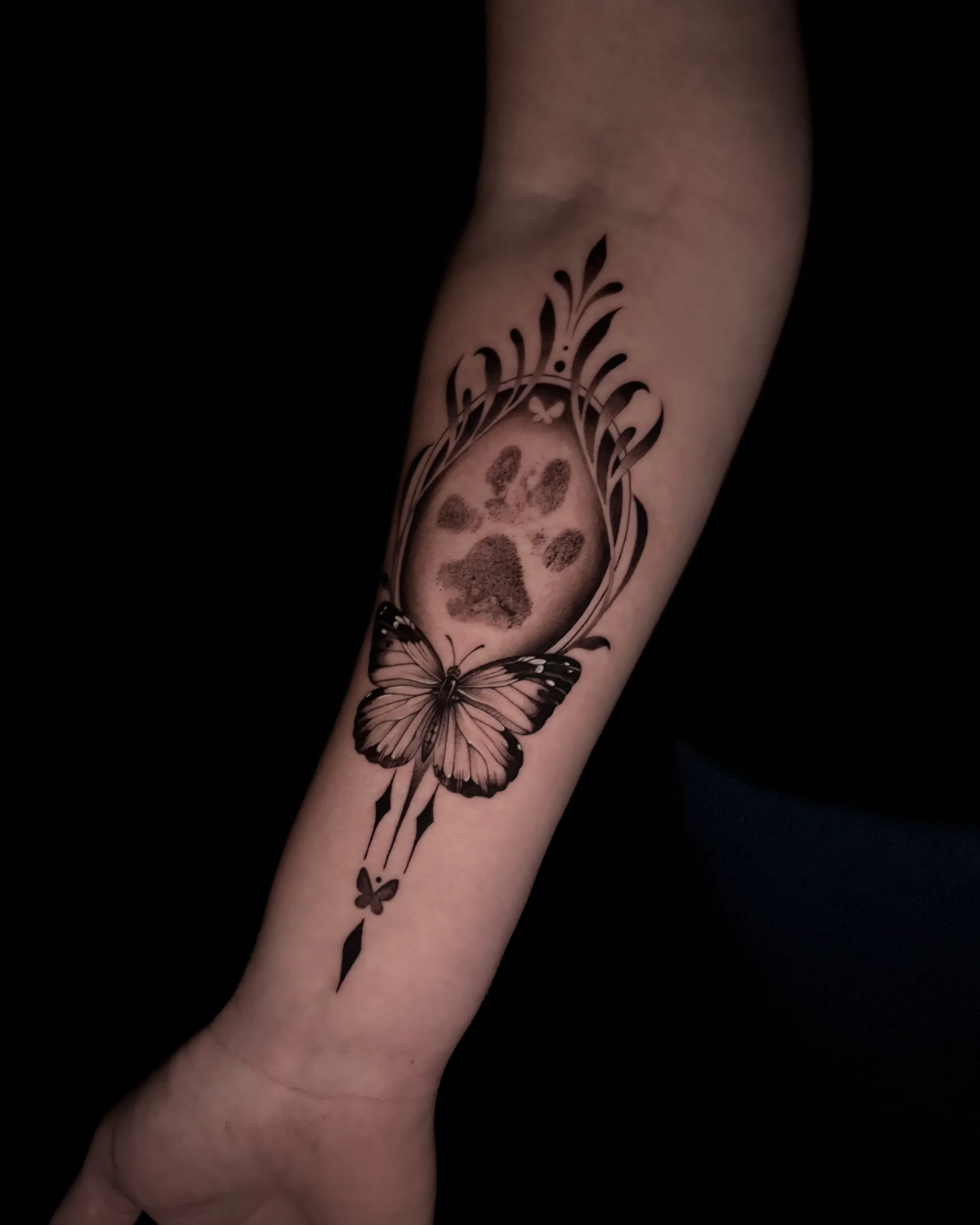 Svenja Soleya Tattoo Auckland ornamental paw print.jpeg
