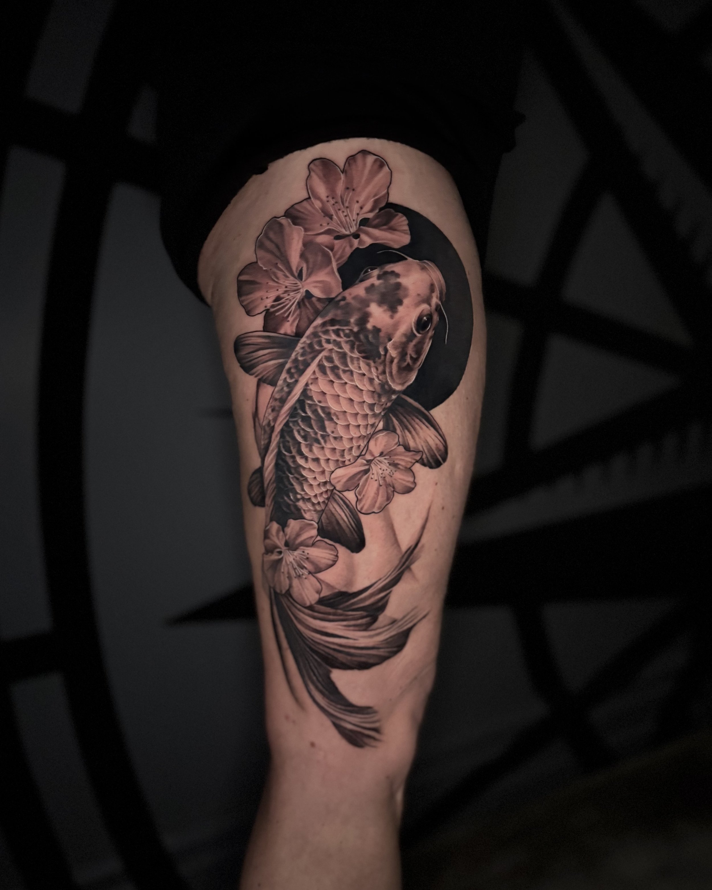 Svenja Soleya Tattoo Auckland black and grey realism koi flowers.jpeg