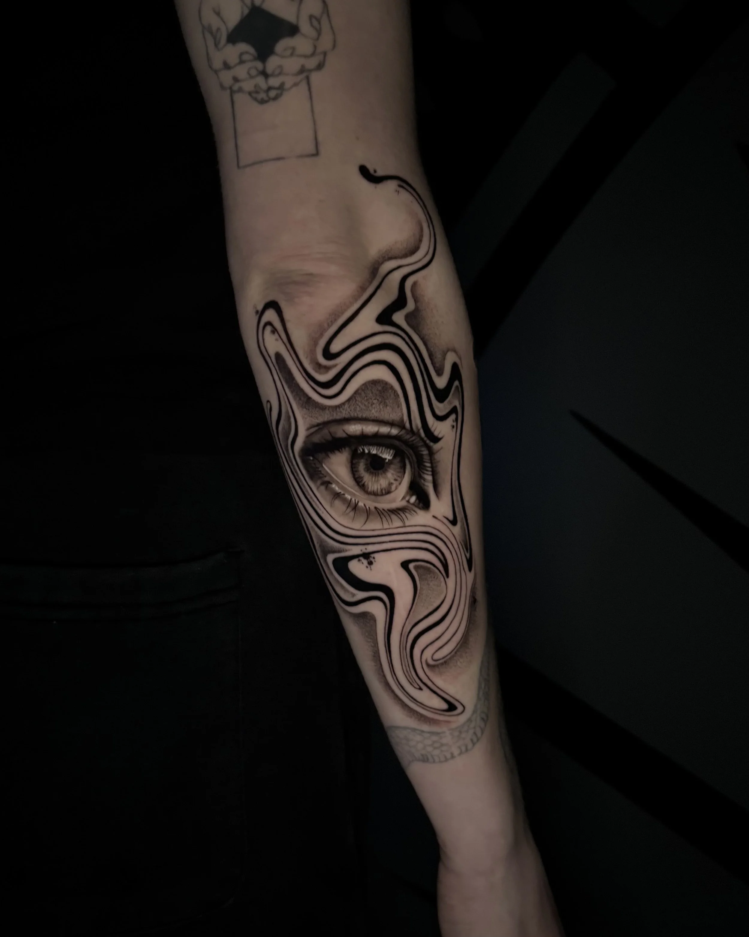 Svenja Soleya Tattoo Auckland black and grey realism psychedelic eye.jpeg