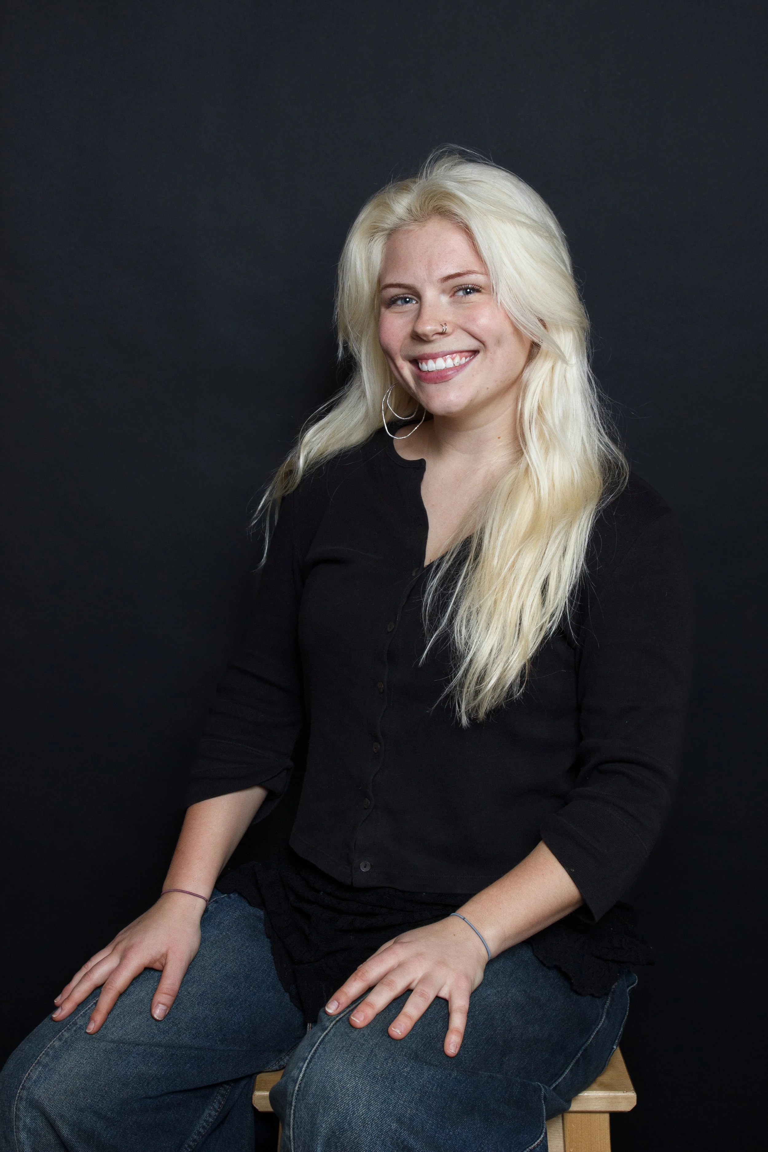 Syd Headshot_Wide Angle.jpg