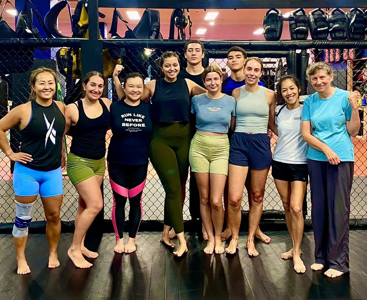 A group of womens self defence participants at training grounds womens self defence.